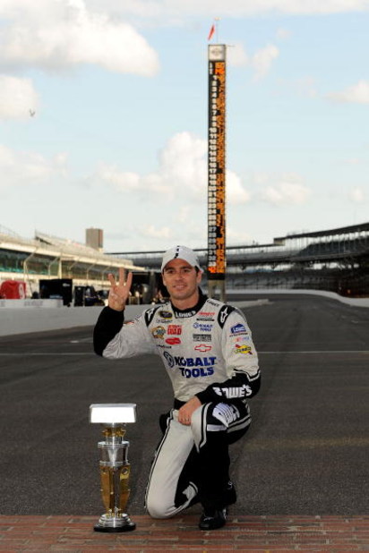 INDIANAPOLIS - JULY 26:  Jimmie Johnson, driver of the #48 Lowe's/KOBALT Tools Chevrolet, celebrates after winning the NASCAR Sprint Cup Series Allstate 400 at the Brickyard at Indianapolis Motor Speedway on July 26, 2009 in Indianapolis, Indiana.  (Photo