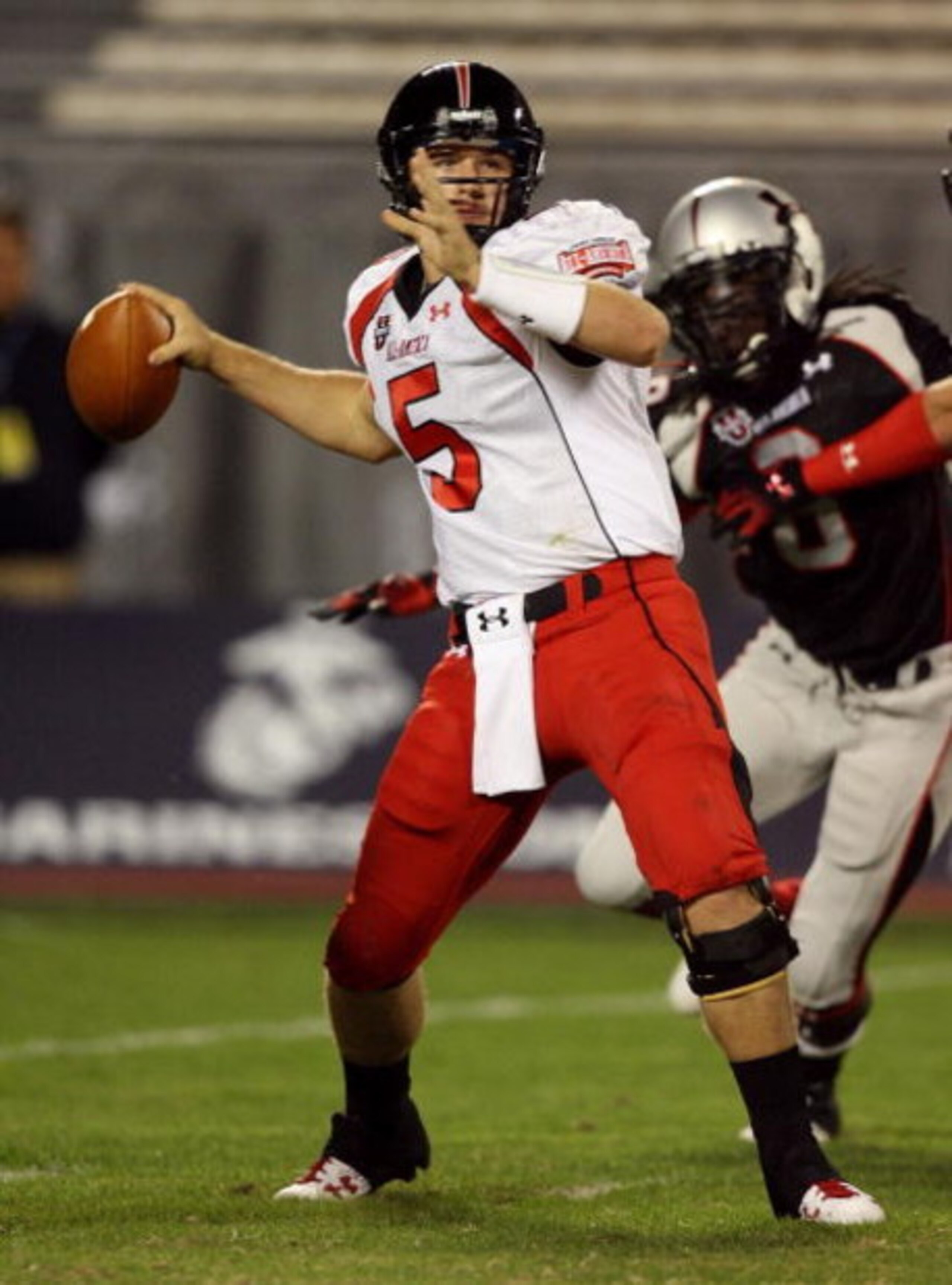 ORLANDO, FL - JANUARY 04:  Matt Barkley #5 of the white team drops back to pass during the All America Under Armour Football Game at Florida Citrus Bowl on January 4, 2009 in Orlando, Florida.  (Photo by Doug Benc/Getty Images)