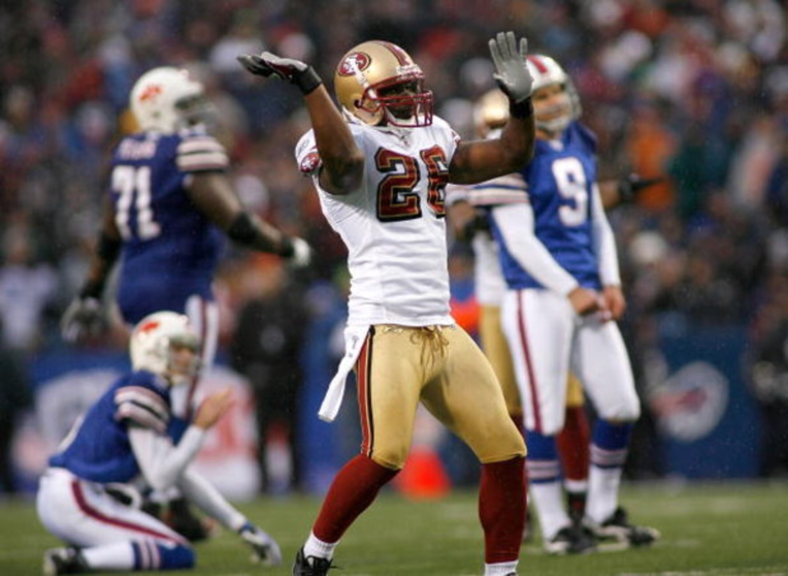 ORCHARD PARK, NY - NOVEMBER 30: Mark Roman #26 of the San Francisco 49ers reacts to Rian Lindell #9 of the Buffalo Bills missing a 40 yard fieldgoal in the fourth quarter  on November 30, 2008 at Ralph Wilson Stadium in Orchard Park, New York.the 49ers wo