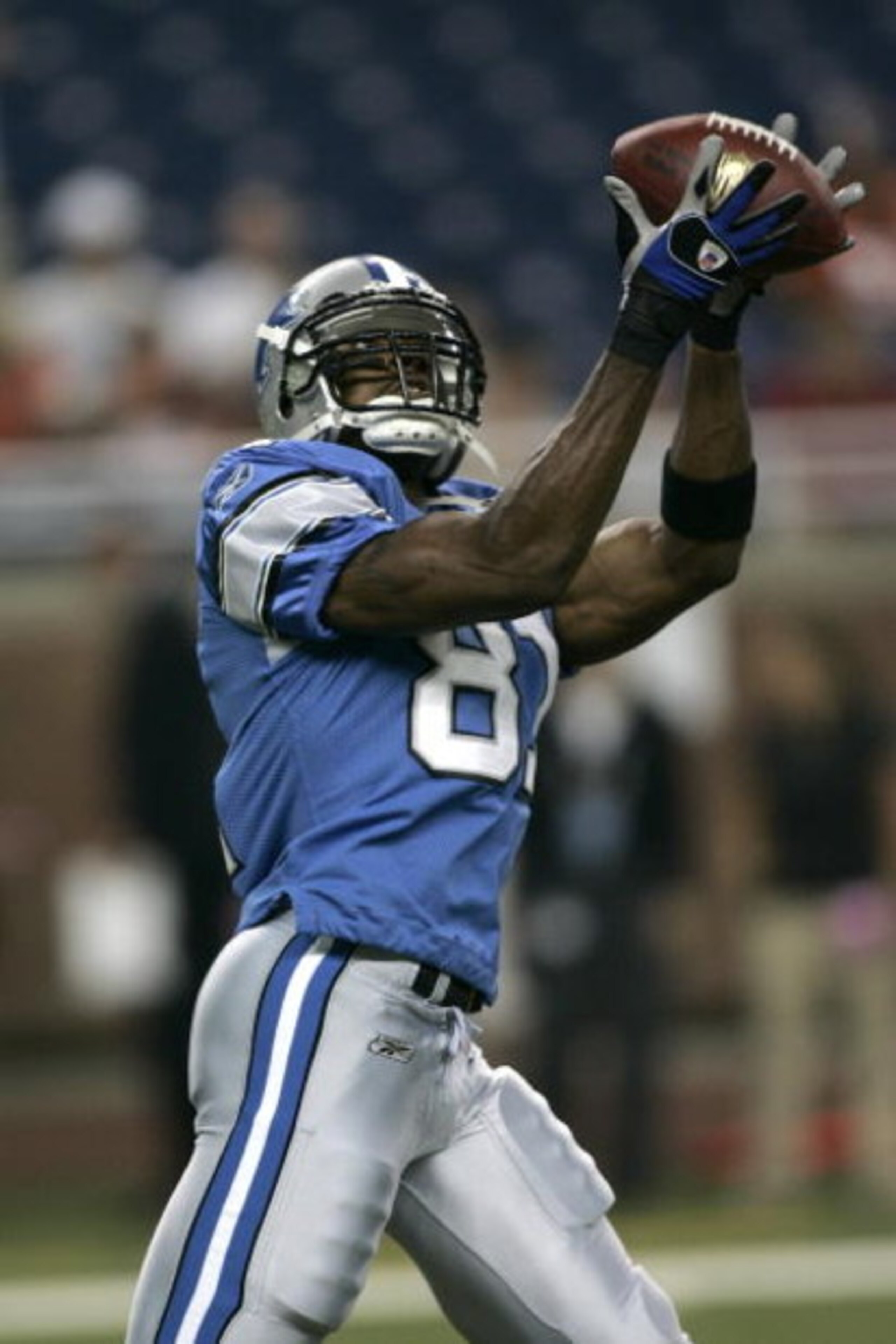 DETROIT, MI - AUGUST 9: Wide receiver Calvin Johnson #82 of the Detroit Lions catches a pass against the Cincinnati Bengals at Ford Field on August 9, 2007 in Detroit, Michigan. The Lions defeated the Bengals 27-26. (Photo by Scott Boehm/Getty Images)