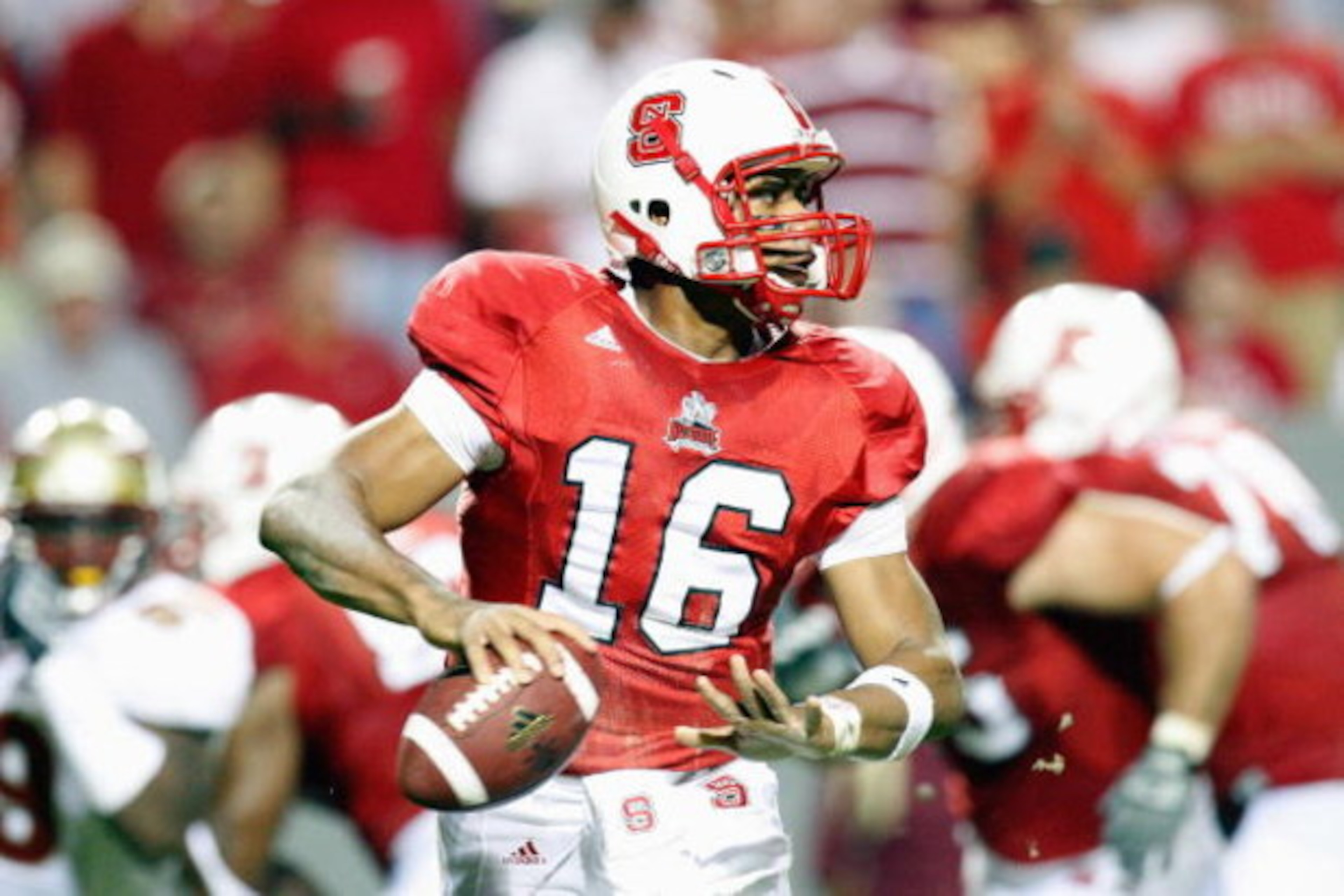 RALEIGH, NC - OCTOBER 16:  Russell Wilson #16 of the North Carolina State Wolfpack looks for a receiver during the game against the Florida State Seminoles at Carter-Finley Stadium on October 16, 2008 in Raleigh, North Carolina.  (Photo by Kevin C. Cox/Ge