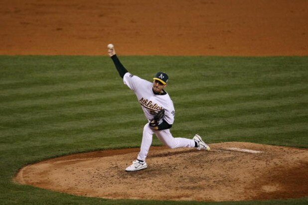 NEW YORK - JULY 15:  American League All-Star Justin Duchscherer #58 of the Oakland Athletics pitches during the 79th MLB All-Star Game at Yankee Stadium on July 15, 2008 in the Bronx borough of New York City. (Photo by Chris McGrath/Getty Images)