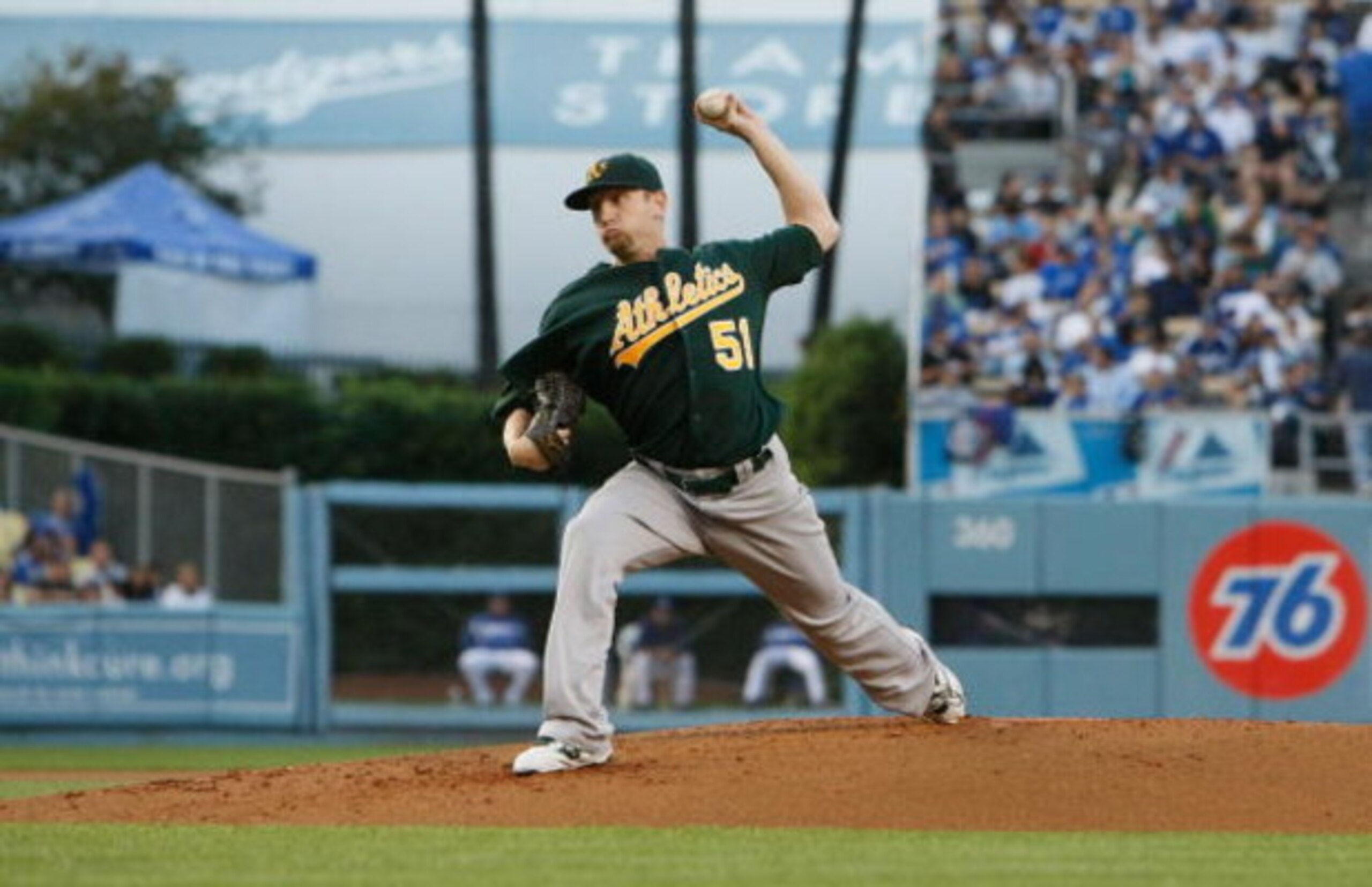 LOS ANGELES, CA - JUNE 16:  Dallas Braden #51 of the Oakland Athletics pitches against the Los Angeles Dodgers at Dodger Stadium on June 16, 2009 in Los Angeles, California.  (Photo by Jeff Gross/Getty Images)