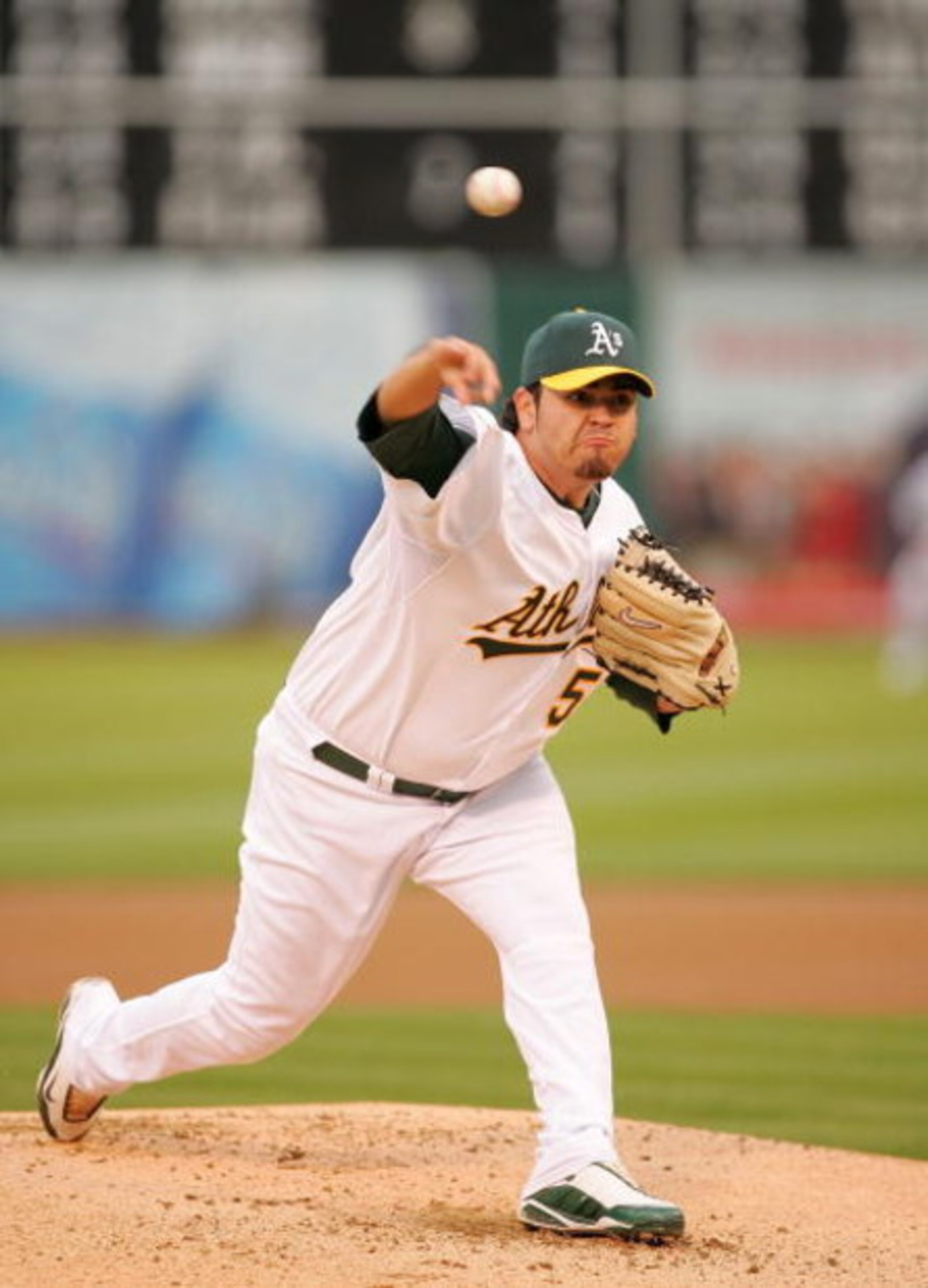 OAKLAND, CA - MAY 23:  Edgar Gonzalez #59 of the Oakland Athletics pitches against the Arizona Diamondbacks at the Oakland Coliseum on May 23, 2009 in Oakland, California.  (Photo by Ezra Shaw/Getty Images)