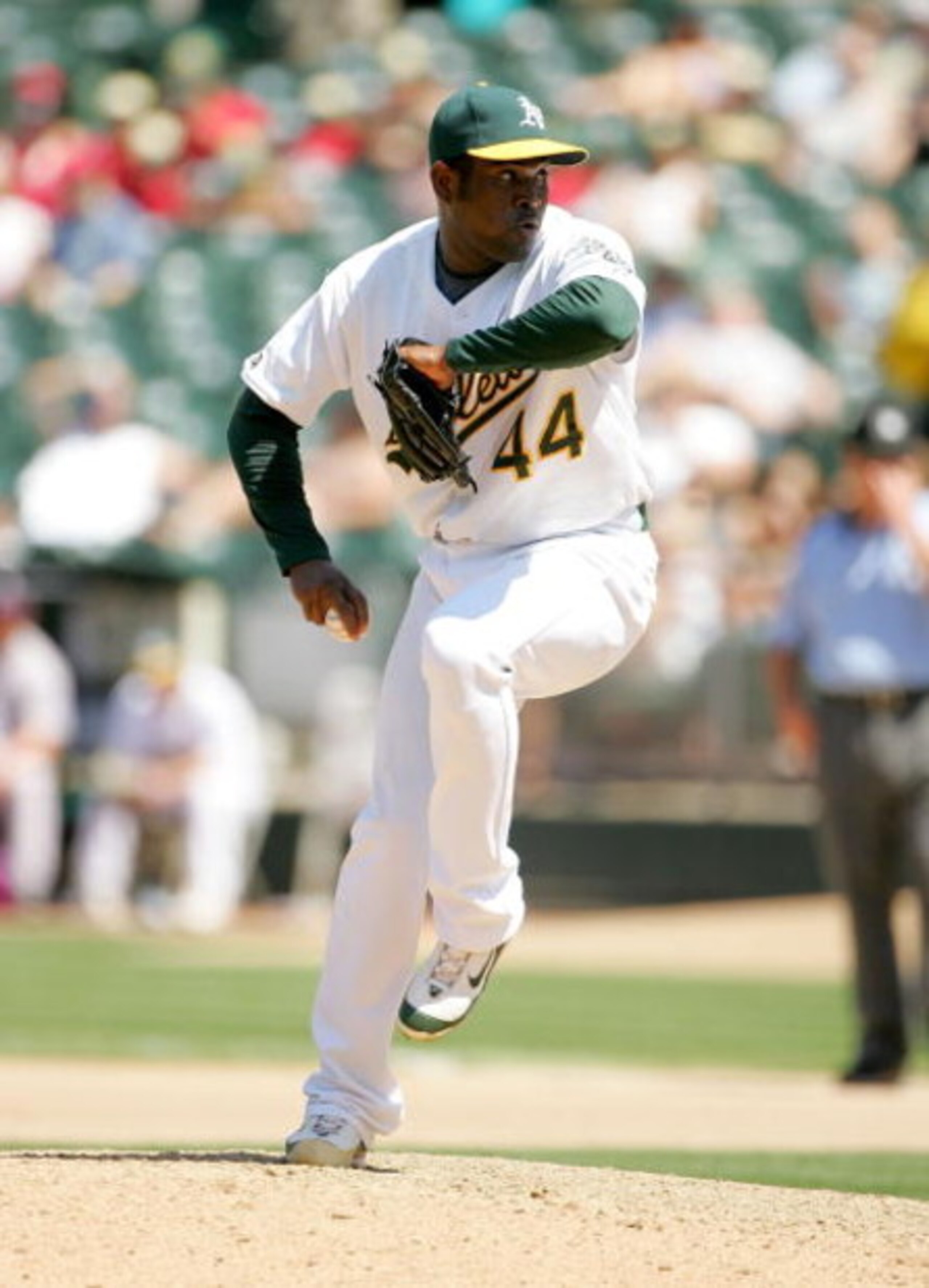 OAKLAND, CA - JUNE 28:  Santiago Casilla #44 of the Oakland Athletics pitches against the Colorado Rockies at the Oakland Coliseum on June 28, 2009 in Oakland, California.  (Photo by Ezra Shaw/Getty Images)