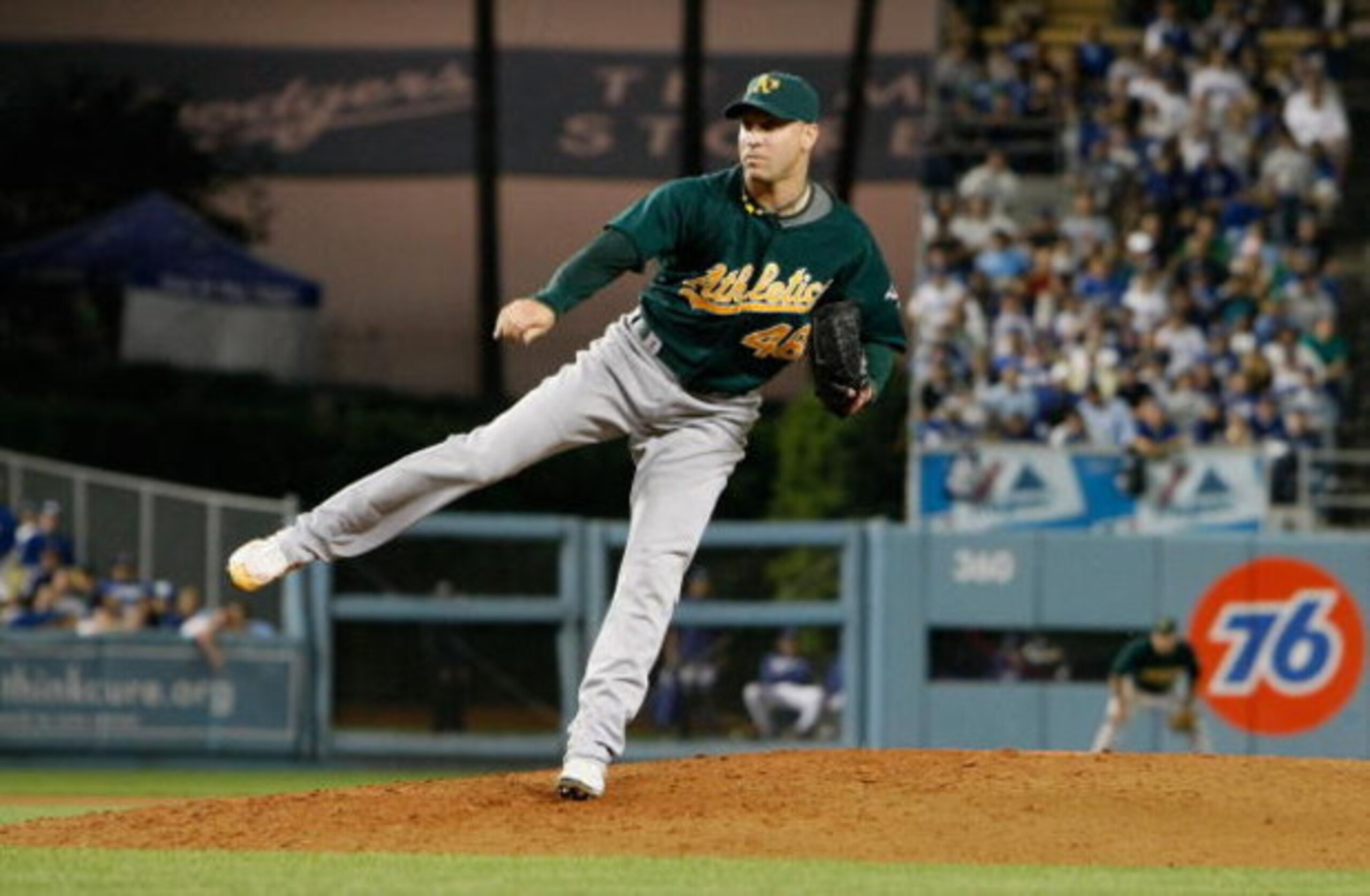 LOS ANGELES, CA - JUNE 16:  Michael Wuertz #48 of the Oakland Athletics pitches against the Los Angeles Dodgers at Dodger Stadium on June 16, 2009 in Los Angeles, California.  (Photo by Jeff Gross/Getty Images)