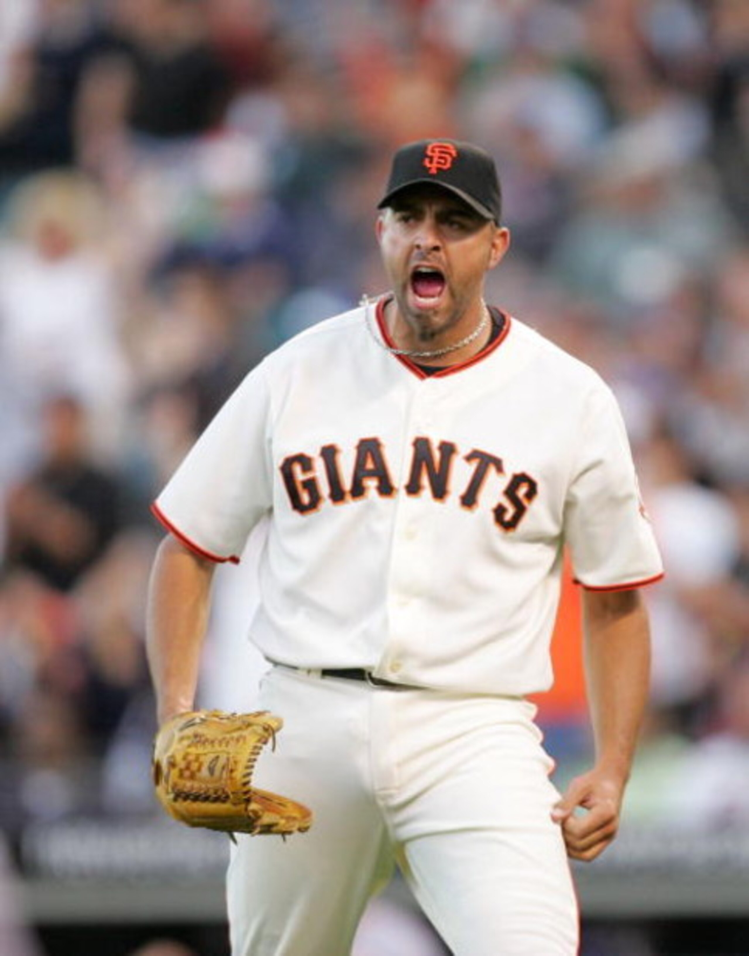 SAN FRANCISCO - MAY 17:  Pitcher Jeremy Affeldt #41of the San Francisco Giants celebrates after the Mets hit in to a double play with the bases loaded to end the eighth inning of their game against the New York Mets at AT&T Park on May 17, 2009 in San Fra