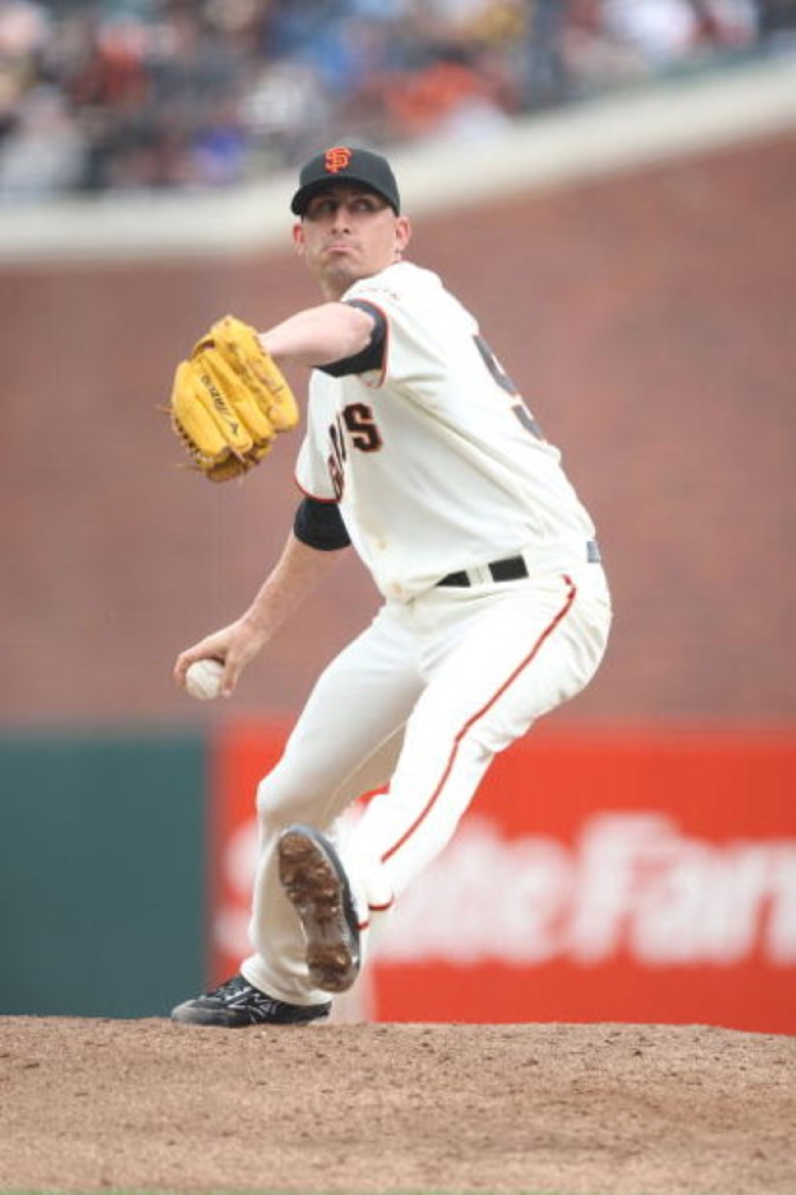 SAN FRANCISCO - APRIL 07:  Brandon Medders #52 of the San Francisco Giants pitches against the Milwaukee Brewers during Opening Day of the Major League Baseball season on April 7, 2009 at AT&T Park in San Francisco, California.  (Photo by Jed Jacobsohn/Ge