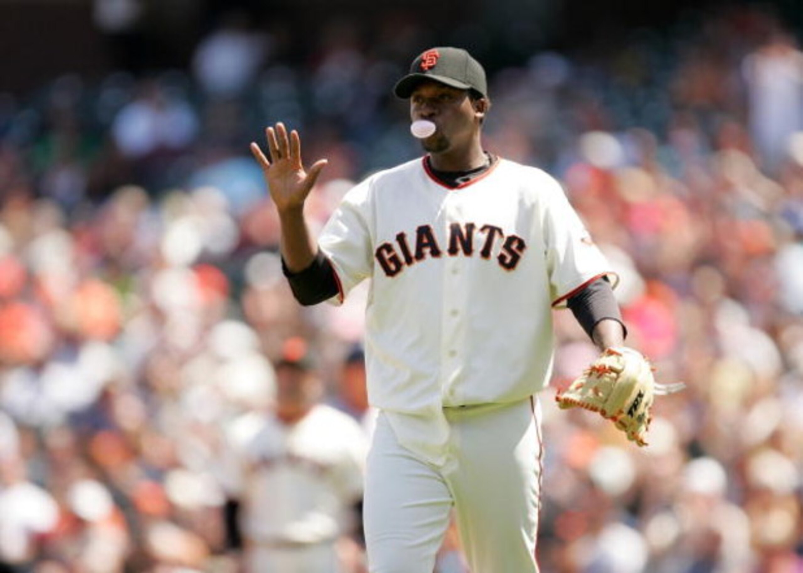 SAN FRANCISCO - MAY 13:  Merkin Valdez #47 of the San Francisco Giants waves to the third baseman after he made a good play during their game against the Washington Nationals at AT&T Park on May 13, 2009 in San Francisco, California.  (Photo by Ezra Shaw/