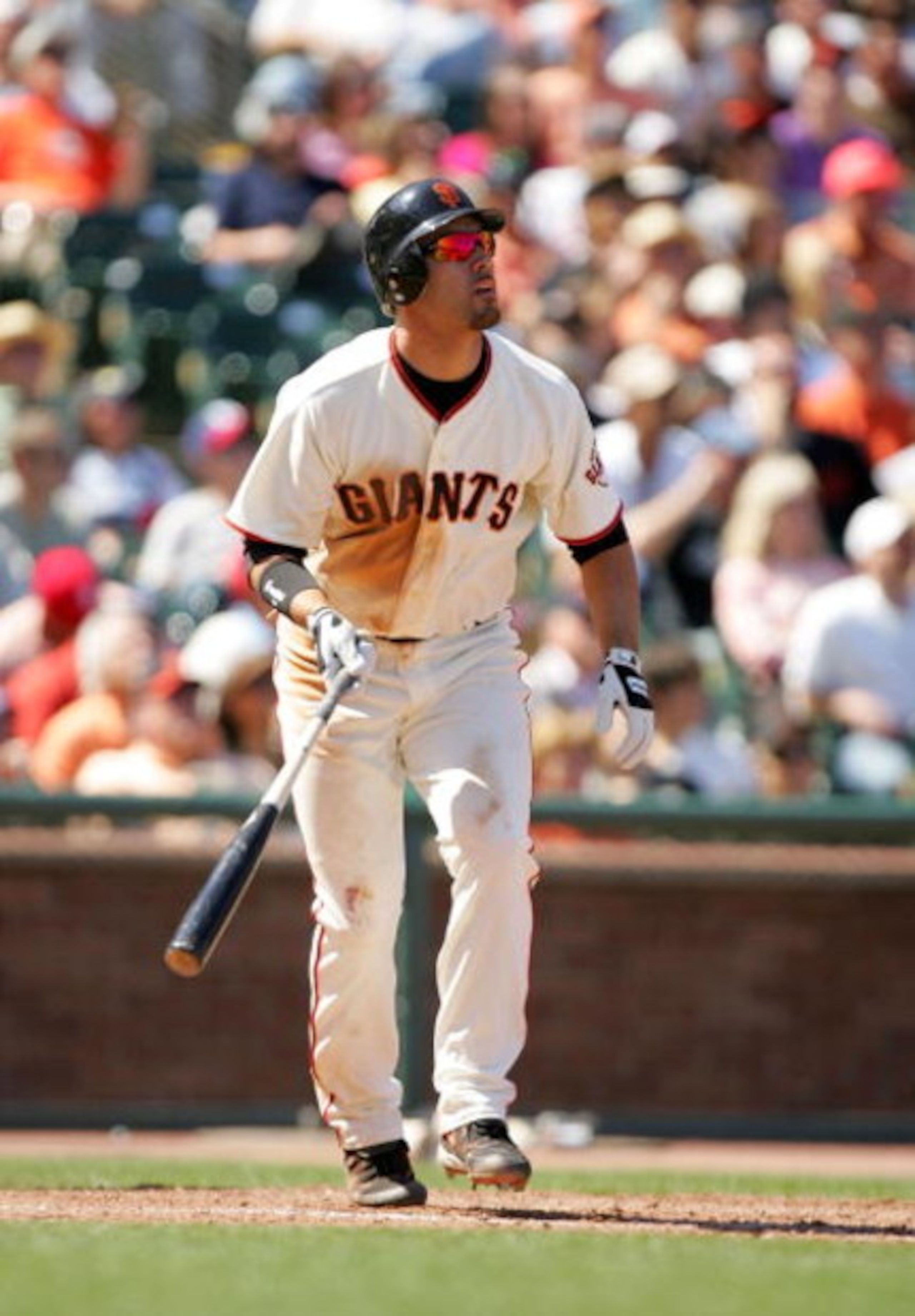 SAN FRANCISCO - MAY 25:  Travis Ishikawa #10 of the San Francisco Giants hits a three run home run in the seventh inning of their game against the Atlanta Braves at AT&T Park on May 25, 2009 in San Francisco, California.  (Photo by Ezra Shaw/Getty Images)