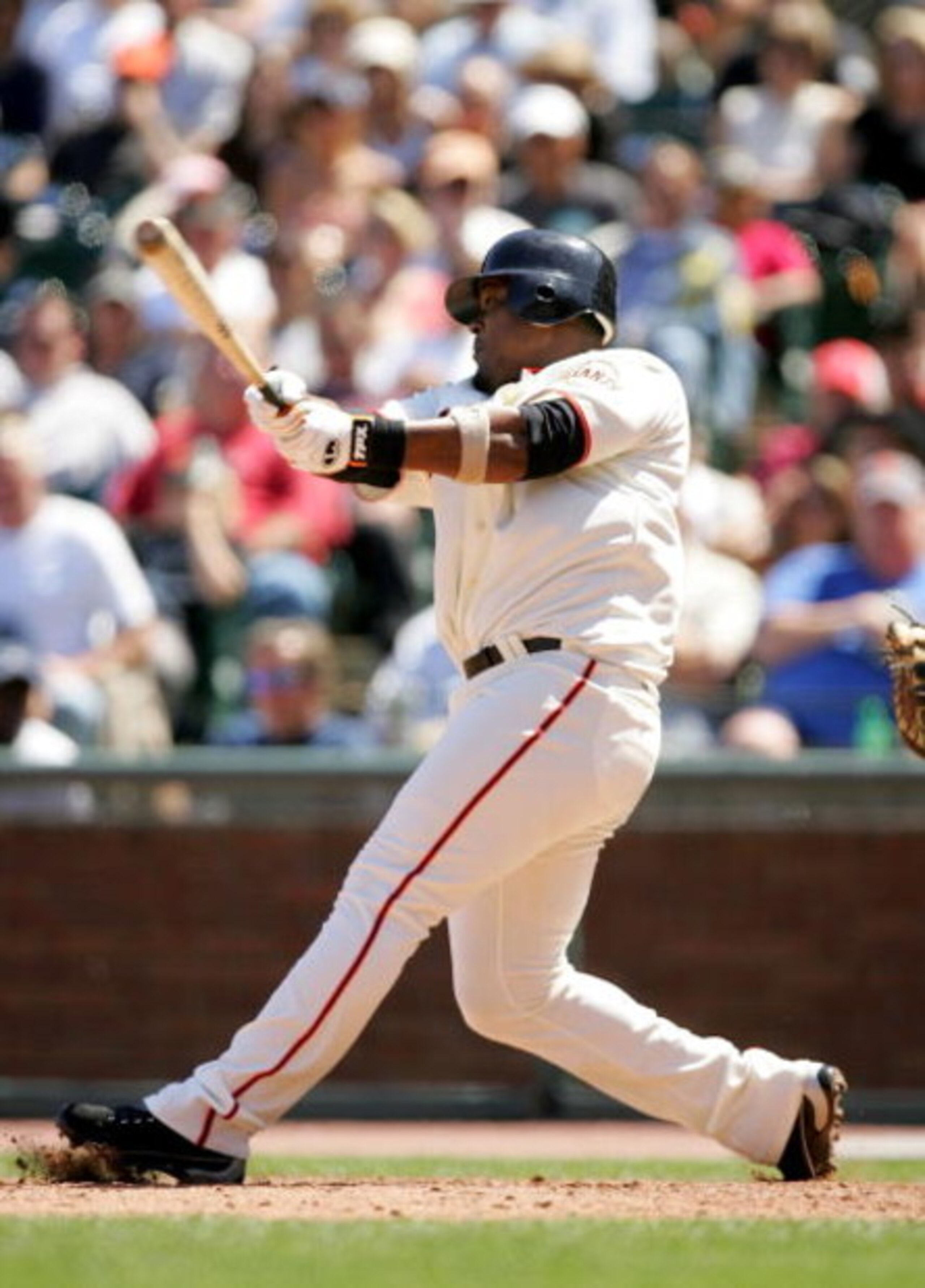SAN FRANCISCO - JUNE 17:  Juan Uribe #5 of the San Francisco Giants bats against the Los Angeles Angels of Anaheim at AT&T Park on June 17, 2009 in San Francisco, California.  (Photo by Ezra Shaw/Getty Images)