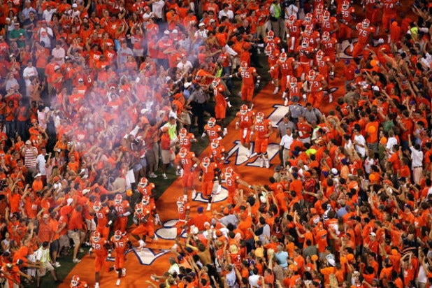 CLEMSON, SC - SEPTEMBER 3:  The Clemson Tigers enter the field between crowds of fans for their game against the Texas A&M Aggies at Clemson Memorial Stadium on September 3, 2005 in Clemson, South Carolina. Clemson defeated Texas A&M 25-24.  (Photo by Str