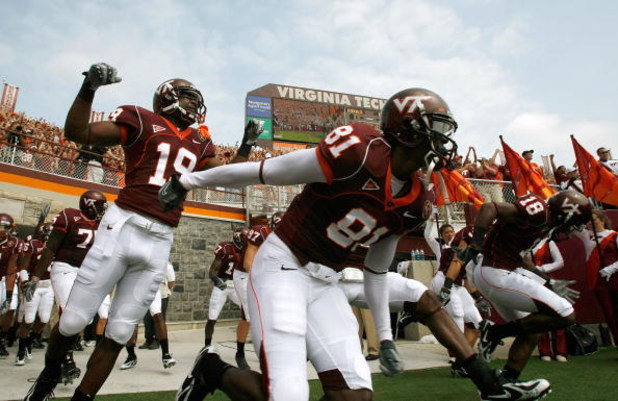 BLACKSBURG, VA - SEPTEMBER 01:  The Virginia Tech football team takes the field after a ceremony honoring the 32 victims of the shooting at the school, before the start of the season opener September 1, 2007 at Lane Stadium in Blacksburg, Virginia. In add