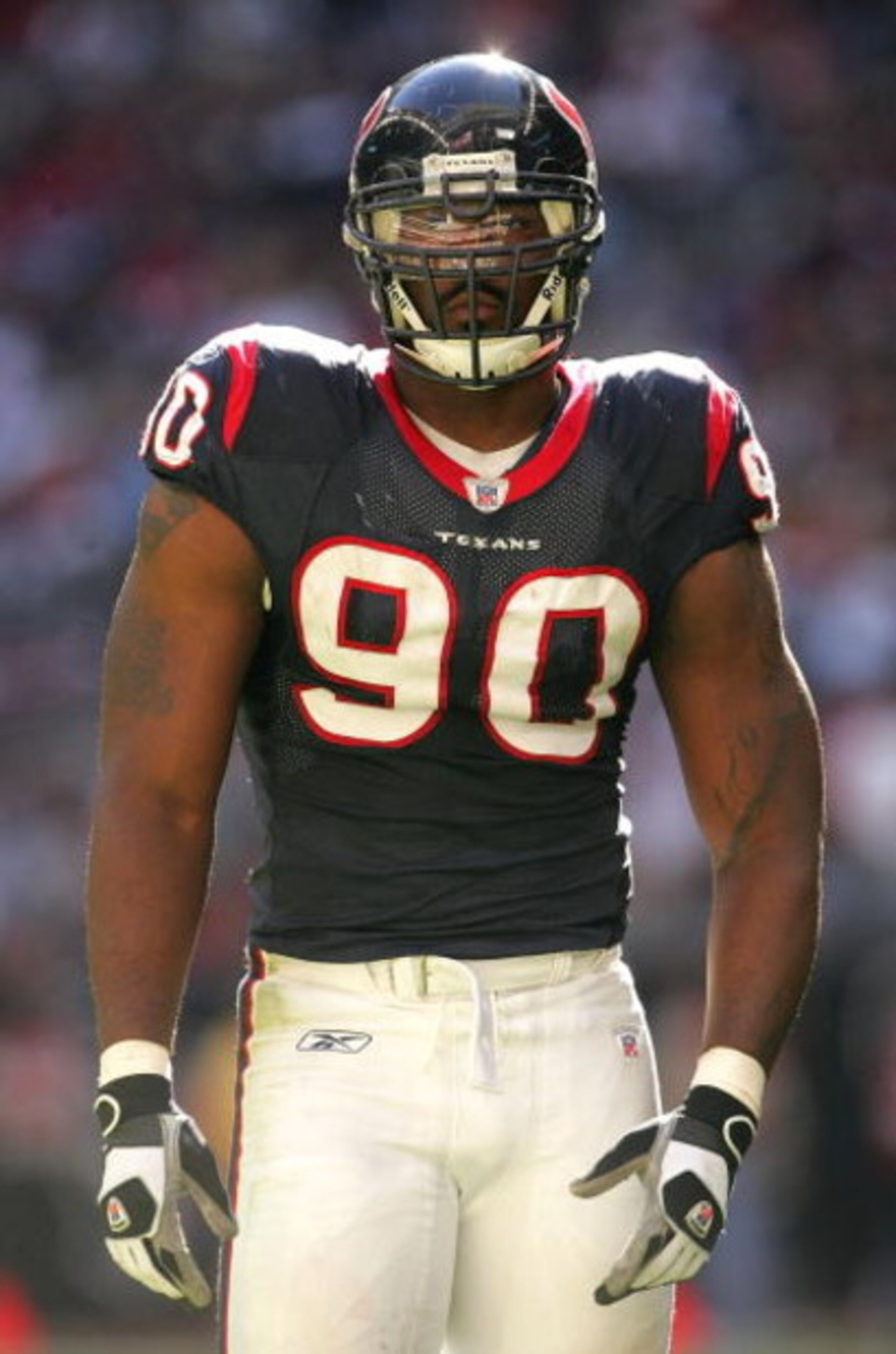 HOUSTON - NOVEMBER 19:  Defensive end Mario Williams #90 of the Houston Texans battles waits for action against the Buffalo Bills at Reliant Stadium November 19, 2006 in Houston, Texas. The Bills won 24-21.  (Photo by Stephen Dunn/Getty Images)