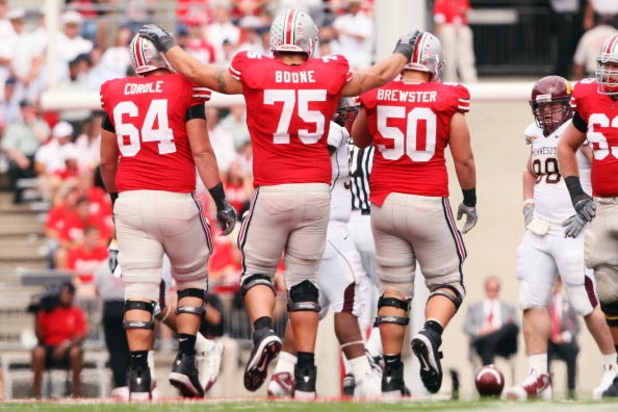 COLUMBUS, OH - SEPTEMBER 27:  Offensive lineman Jim Cordle #64, Alex Boone #75 and Mike Brewster #50 of the Ohio State Buckeyes walk up the line of scrimmage in the second half of a 34-21 victory over the Minnesota Golden Gophers on September 27, 2008 at 