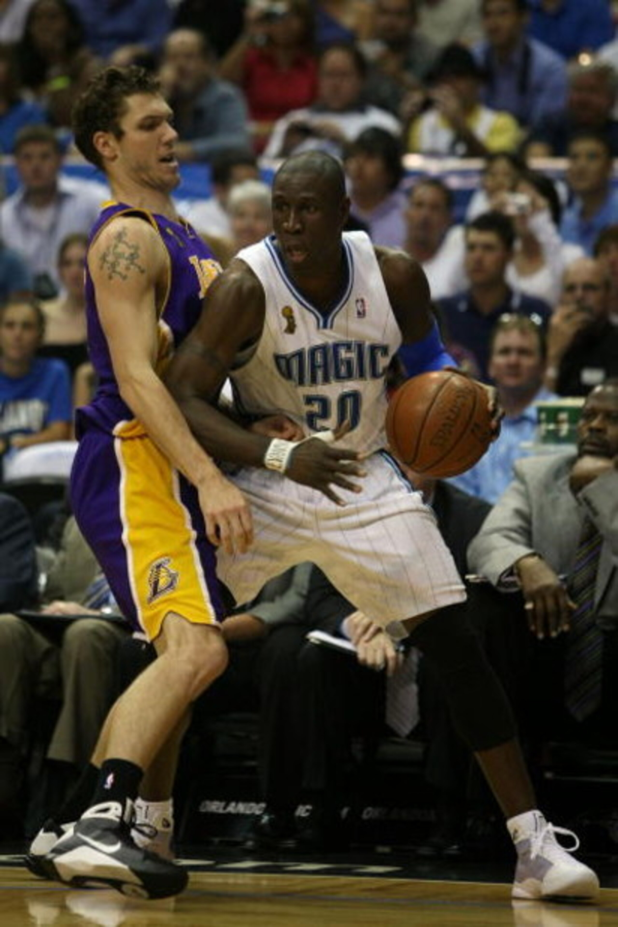 ORLANDO, FL - JUNE 14:  Mickael Pietrus #20 of the Orlando Magic goes up against Luke Walton #4 of the Los Angeles Lakers in Game Five of the 2009 NBA Finals on June 14, 2009 at Amway Arena in Orlando, Florida.  NOTE TO USER:  User expressly acknowledges 