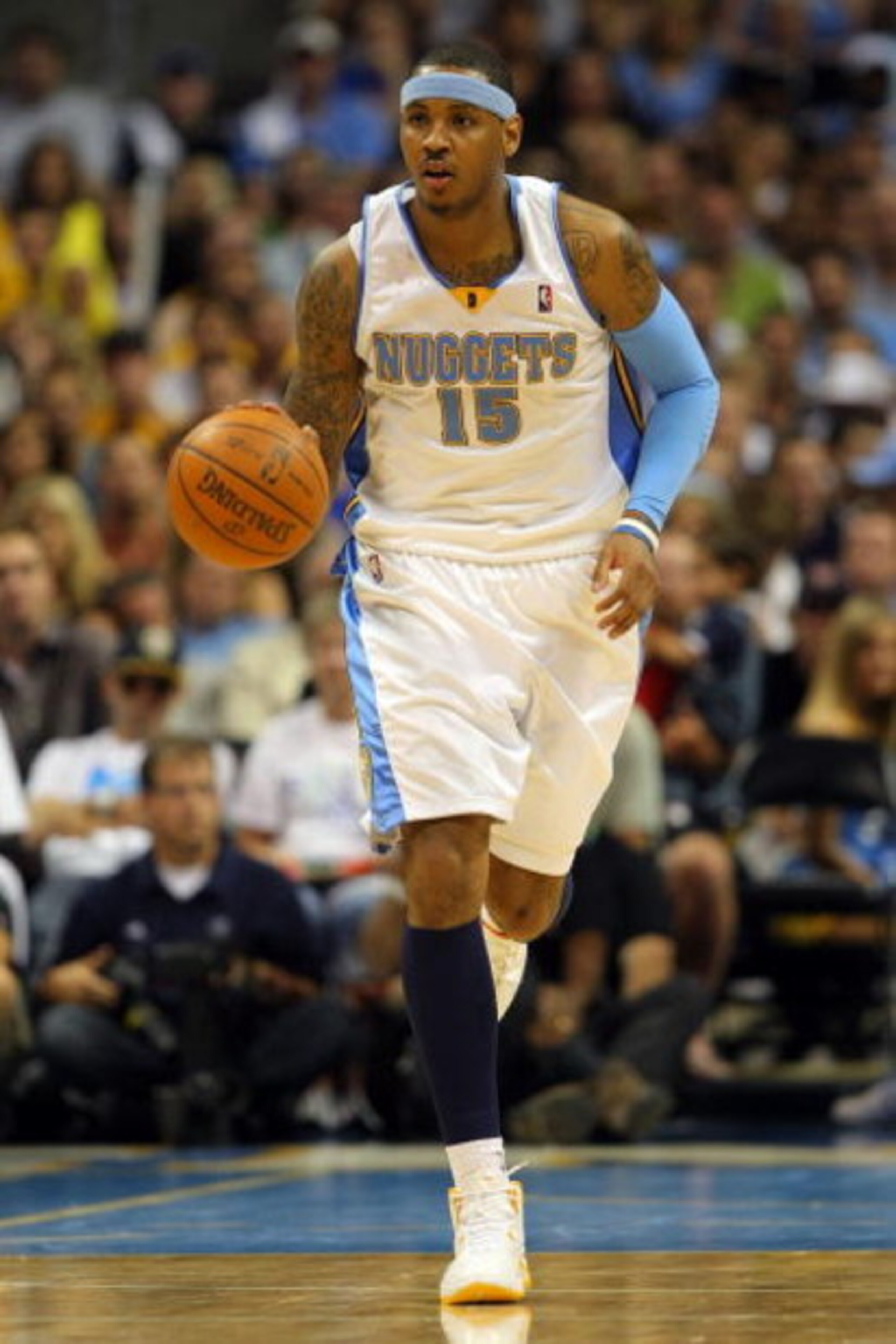 DENVER - MAY 29:  Carmelo Anthony #15 of the Denver Nuggets moves the ball in Game Six of the Western Conference Finals during the 2009 NBA Playoffs against the Los Angeles Lakers at Pepsi Center on May 29, 2009 in Denver, Colorado. NOTE TO USER: User exp