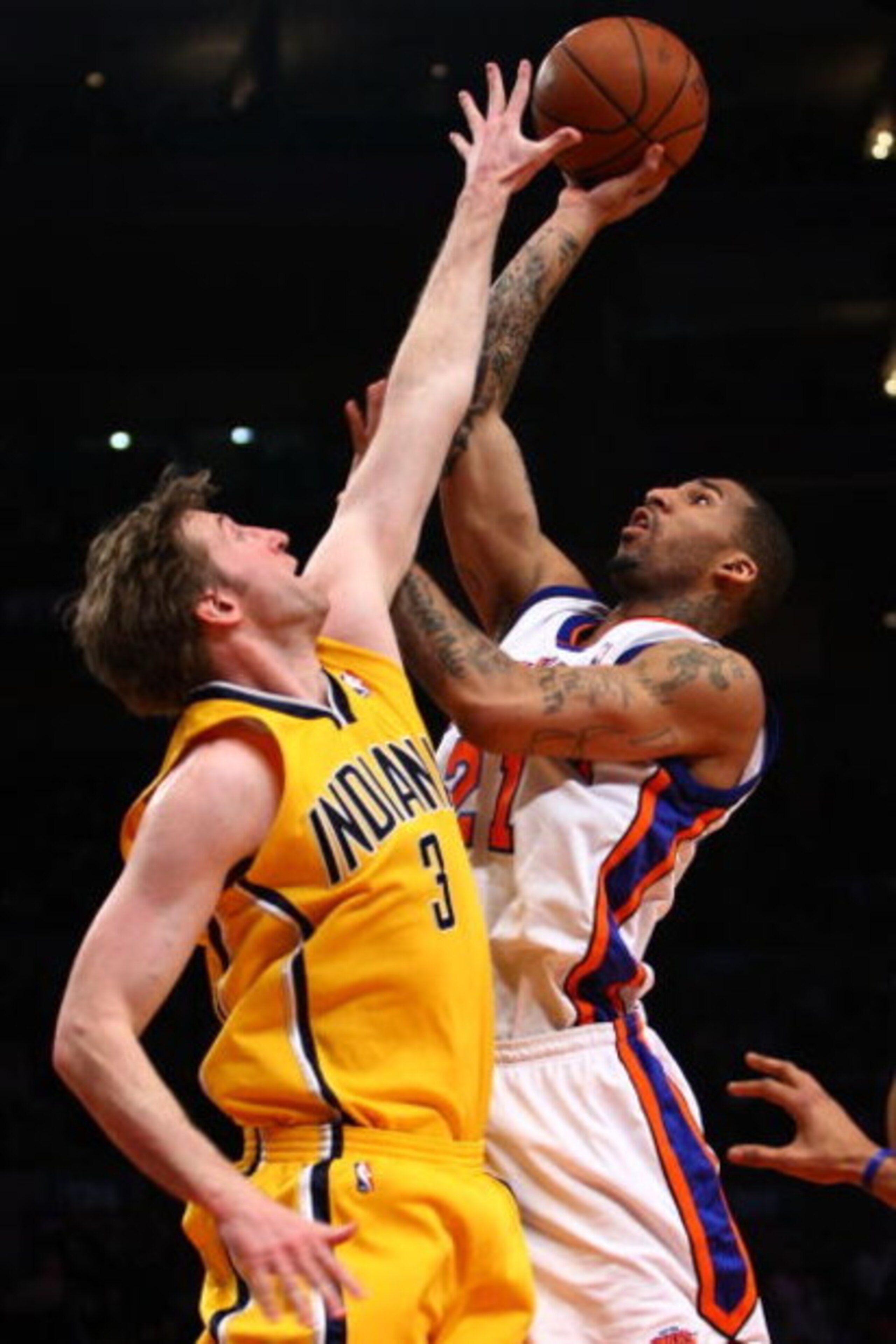 NEW YORK - FEBRUARY 23:  Wilson Chandler #21 of the New York Knicks goes up for a shot against Troy Murphy #3 of the Indiana Pacers at Madison Square Garden February 23, 2009 in New York City. NOTE TO USER: User expressly acknowledges and agrees that, by 