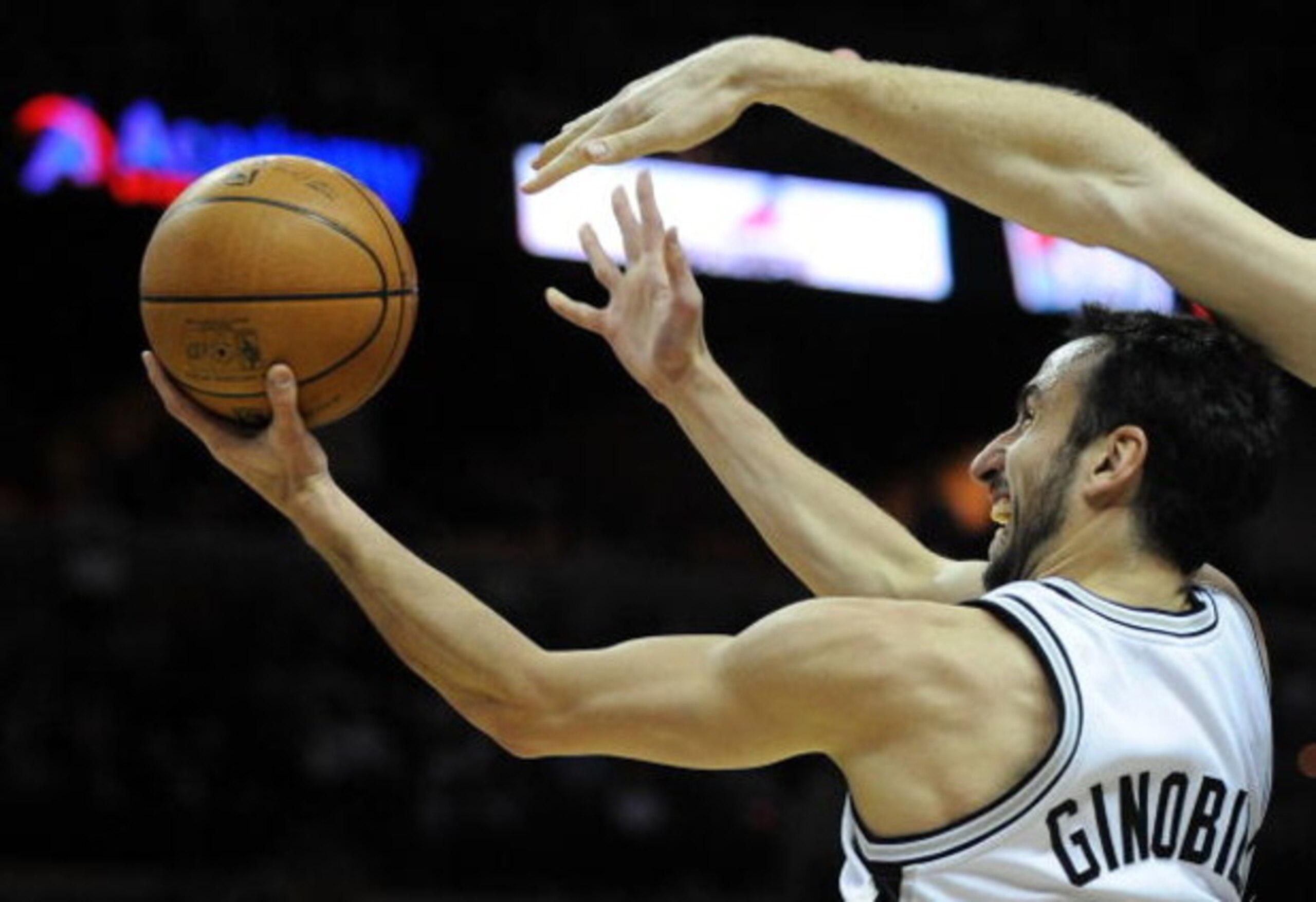 SAN ANTONIO - JANUARY 31:  Guard Manu Ginobili #20 of the San Antonio Spurs takes a shot against the New Orleans Hornets on January 31, 2009 at AT&T Center in San Antonio, Texas.  NOTE TO USER: User expressly acknowledges and agrees that, by downloading a