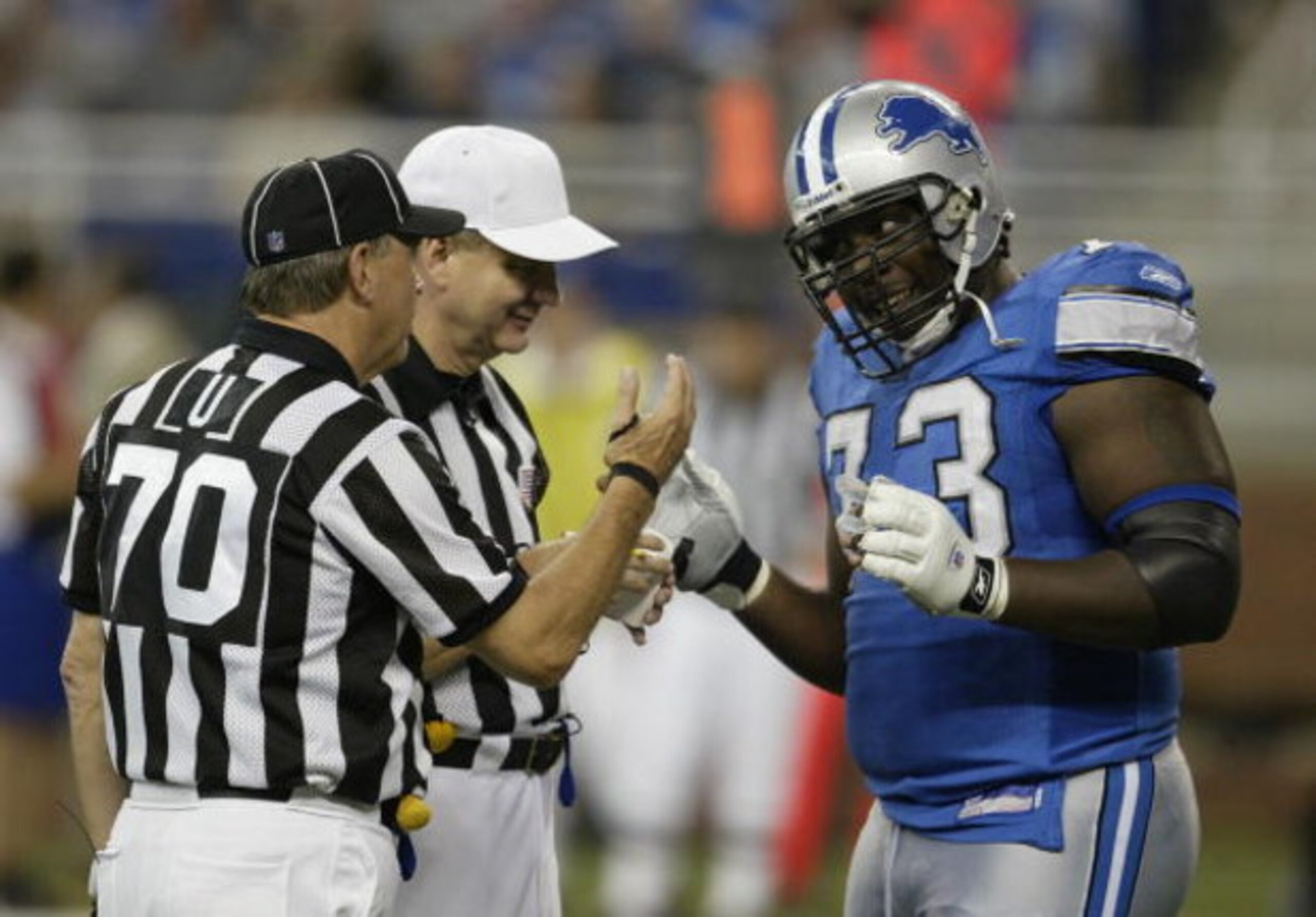 DETROIT - SEPTEMBER 19:  Tackle Stockar McDougle #73 of the Detroit Lions talks to the officials during the game against the Houston Texans at Ford Field on September 19, 2004 in Detroit, Michigan. The Lions defeated the Texans 28-16.  (Photo by Tom Pidge