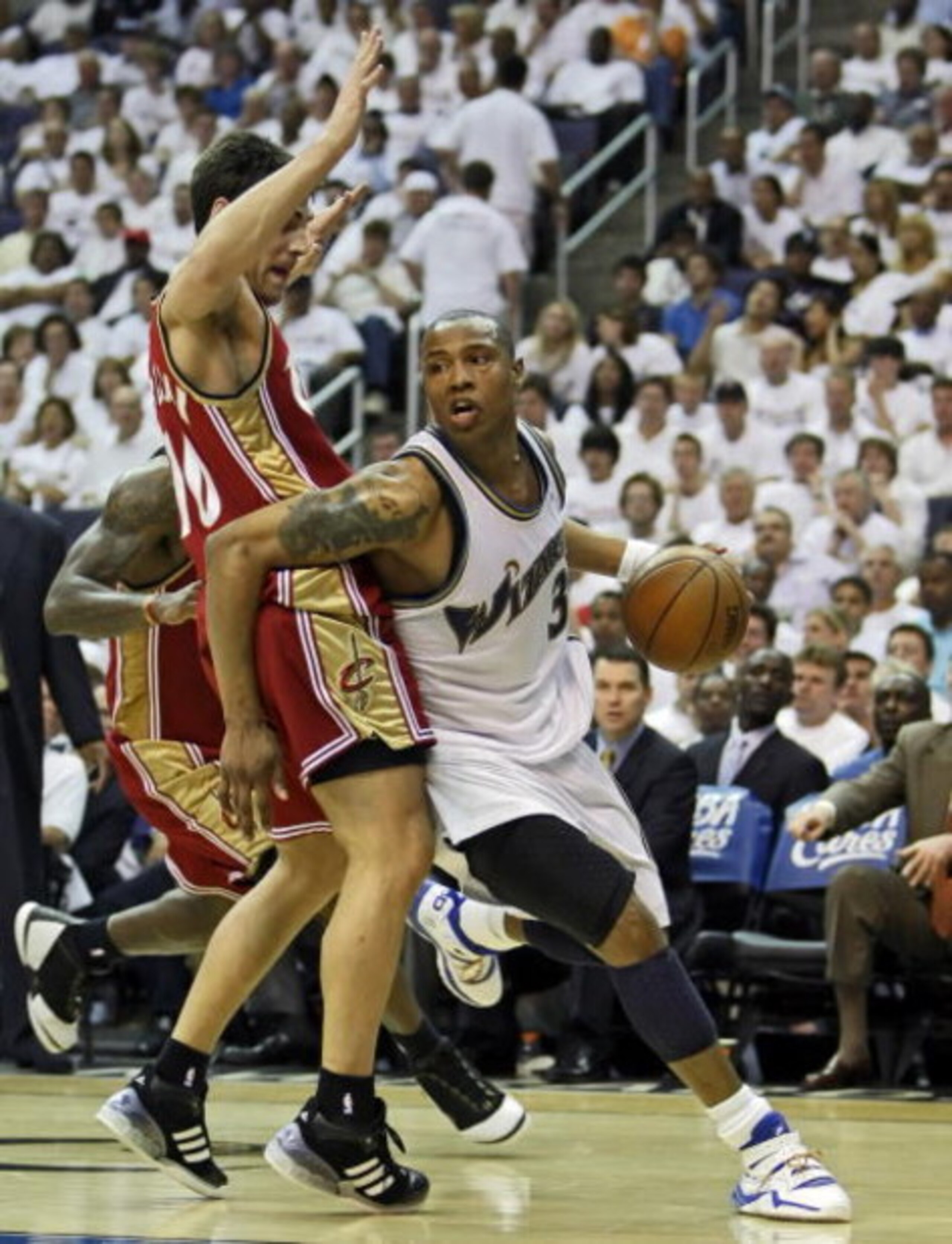 WASHINGTON - MAY 2: Caron Butler #3 of the Washington Wizards gets fouled by Wally Szczerbiak #10 of the Cleveland Cavaliers in Game Six of the Eastern Conference Quarterfinals during the 2008 NBA Playoffs at the Verizon Center on May 2, 2008 in Washingto