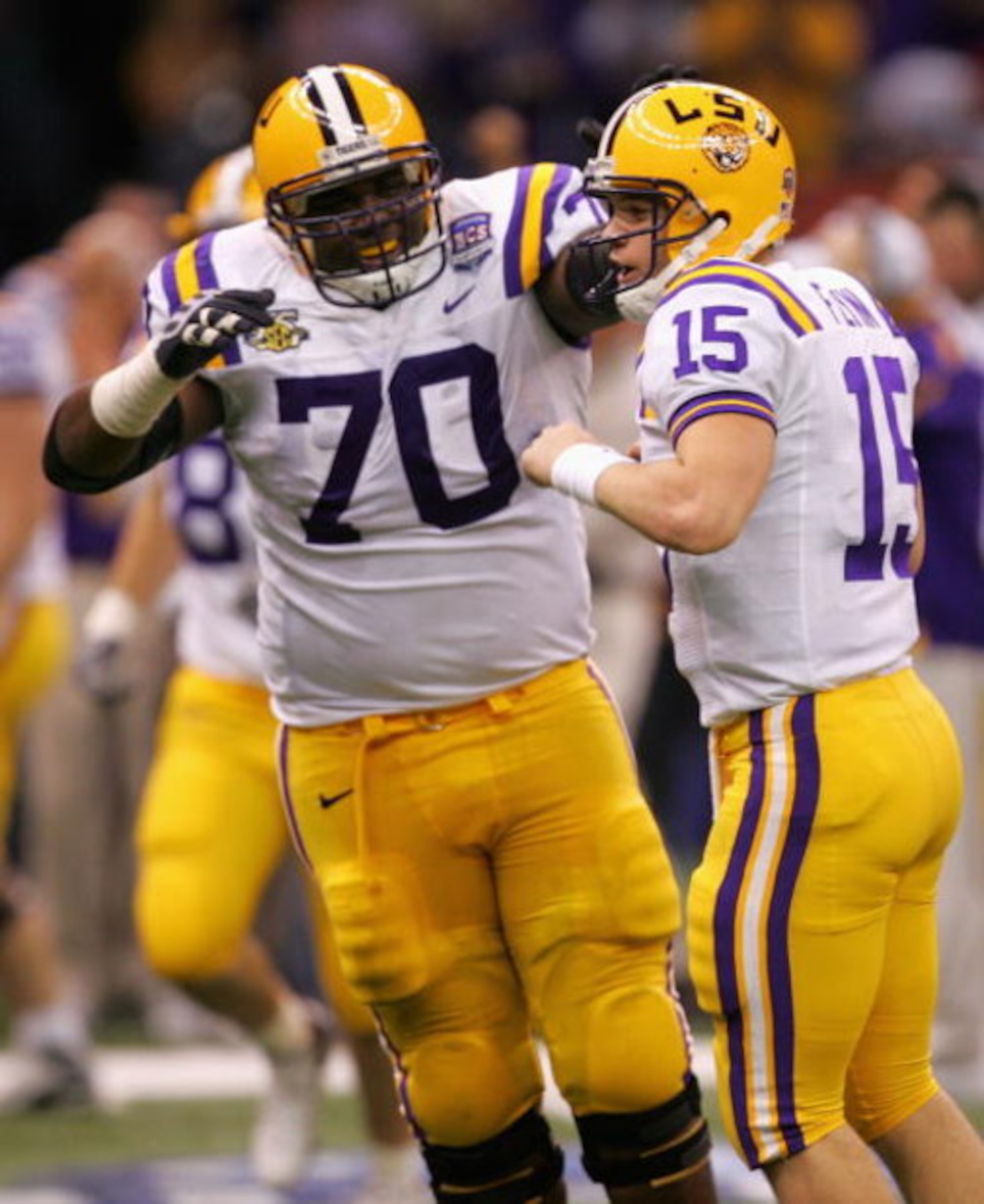 NEW ORLEANS - JANUARY 07:  Matt Flynn #15 of the Louisiana State University Tigers celebrates his 13-yard touchdown pass with Ciron Black #70 against the Ohio State Buckeyes during the AllState BCS National Championship on January 7, 2008 at the Louisiana