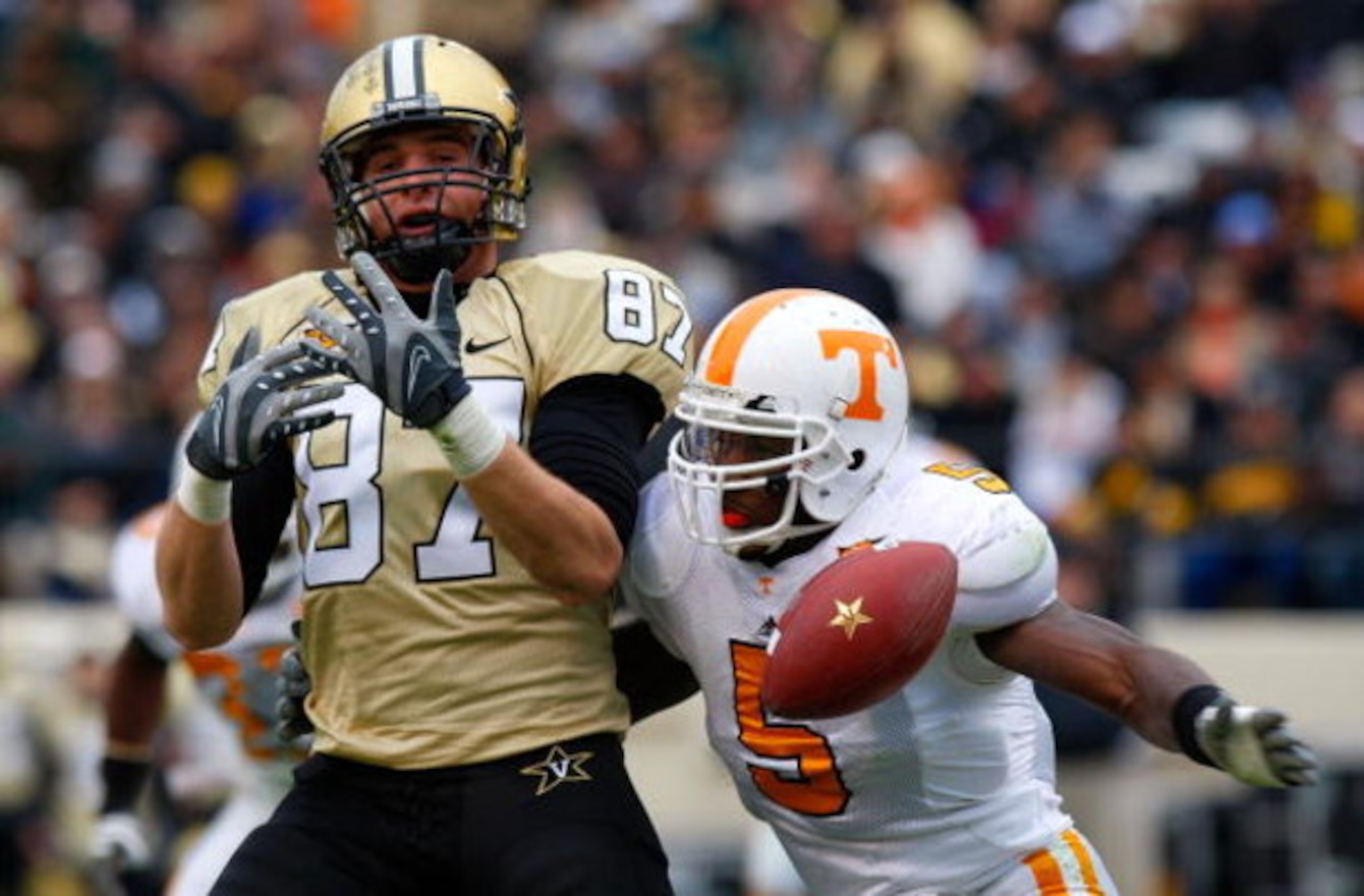 NASHVILLE, TN - NOVEMBER 22:  Linebacker Rico McCoy #5 of the Tennessee Volunteers breaks up a pass intended for tight end Brandon Barden #87 of the Vanderbilt Commodores during the game at Vanderbilt Stadium on November 22, 2008 in Nashville, Tennessee. 
