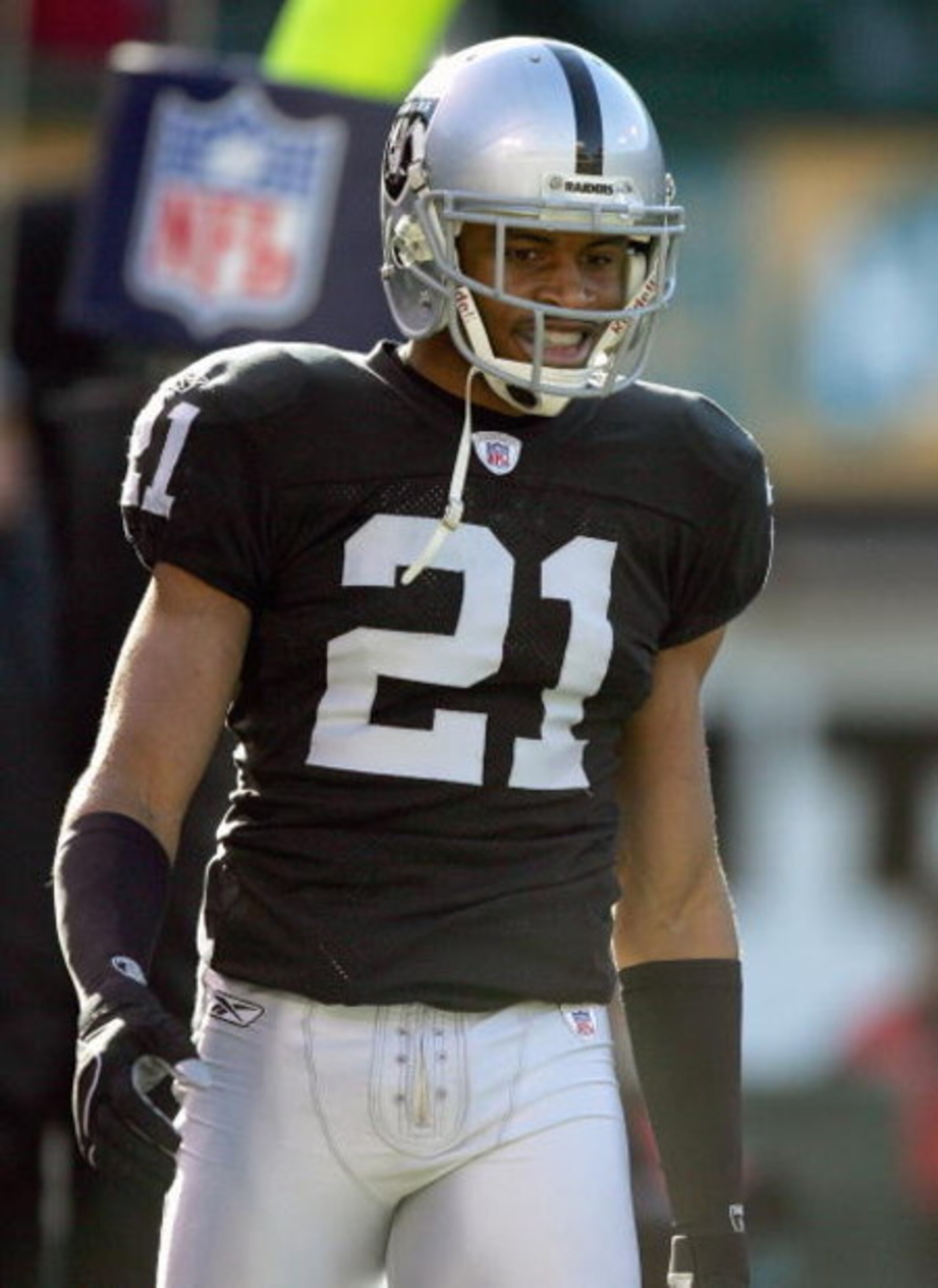 OAKLAND, CA - DECEMBER 17: Nnamdi Asomugha #21 of the Oakland Raiders walks on the field during an NFL game against the St. Louis Rams at McAfee Coliseum December 17, 2006 in Oakland, California. (Photo by Jed Jacobsohn/Getty Images)