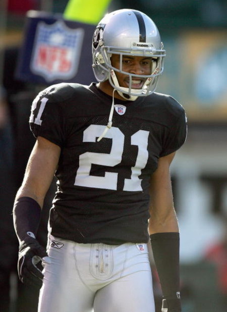 OAKLAND, CA - DECEMBER 17: Nnamdi Asomugha #21 of the Oakland Raiders walks on the field during an NFL game against the St. Louis Rams at McAfee Coliseum December 17, 2006 in Oakland, California. (Photo by Jed Jacobsohn/Getty Images)