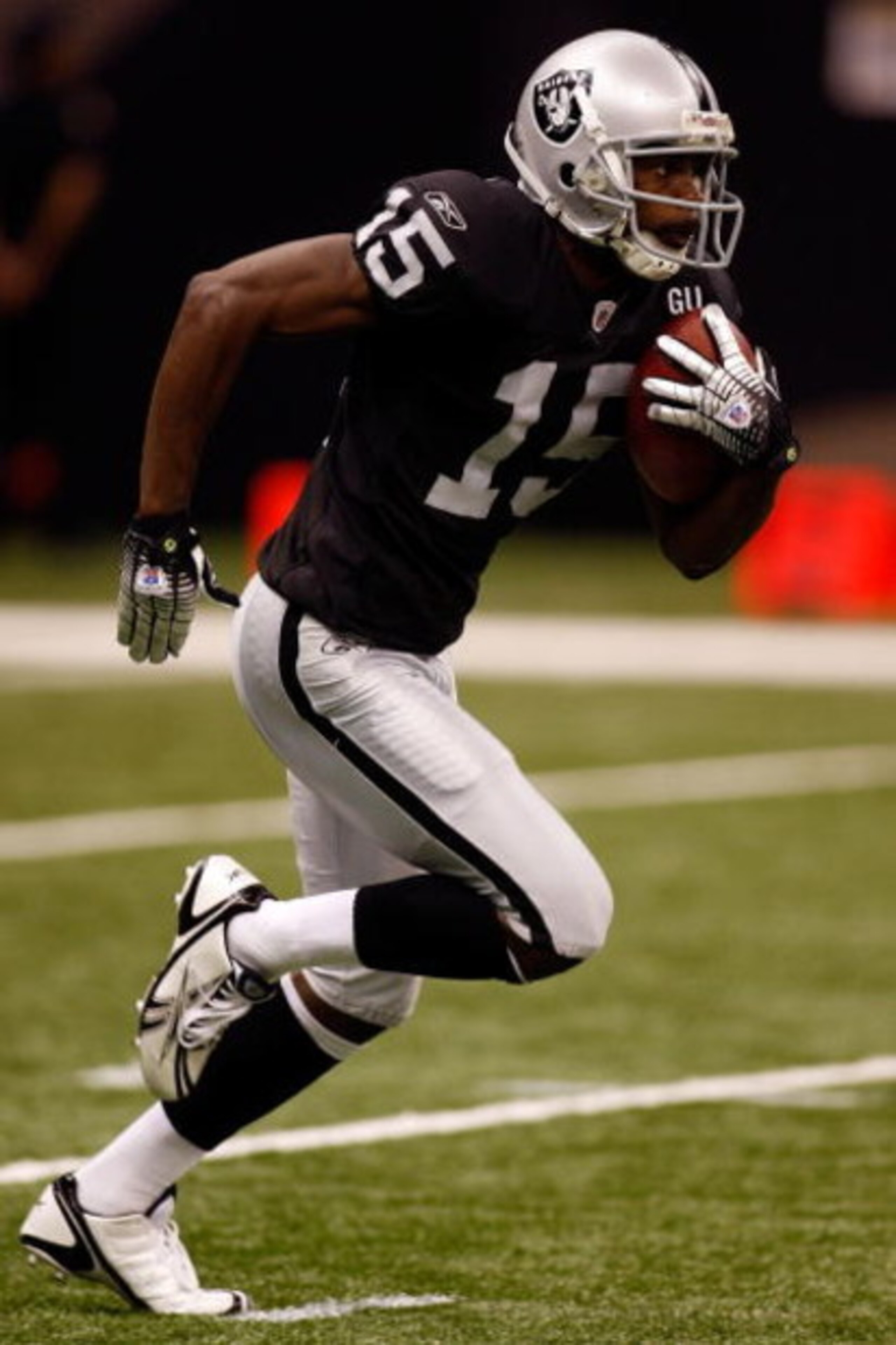 NEW ORLEANS - OCTOBER 12:  Johnnie Lee Higgins #15 of the Oakland Raiders plays against the New Orleans Saints during their NFL game on October 12, 2008 at the Superdome in New Orleans, Louisiana. The Saints defeated the Raiders 34-3.  (Photo by Chris Gra
