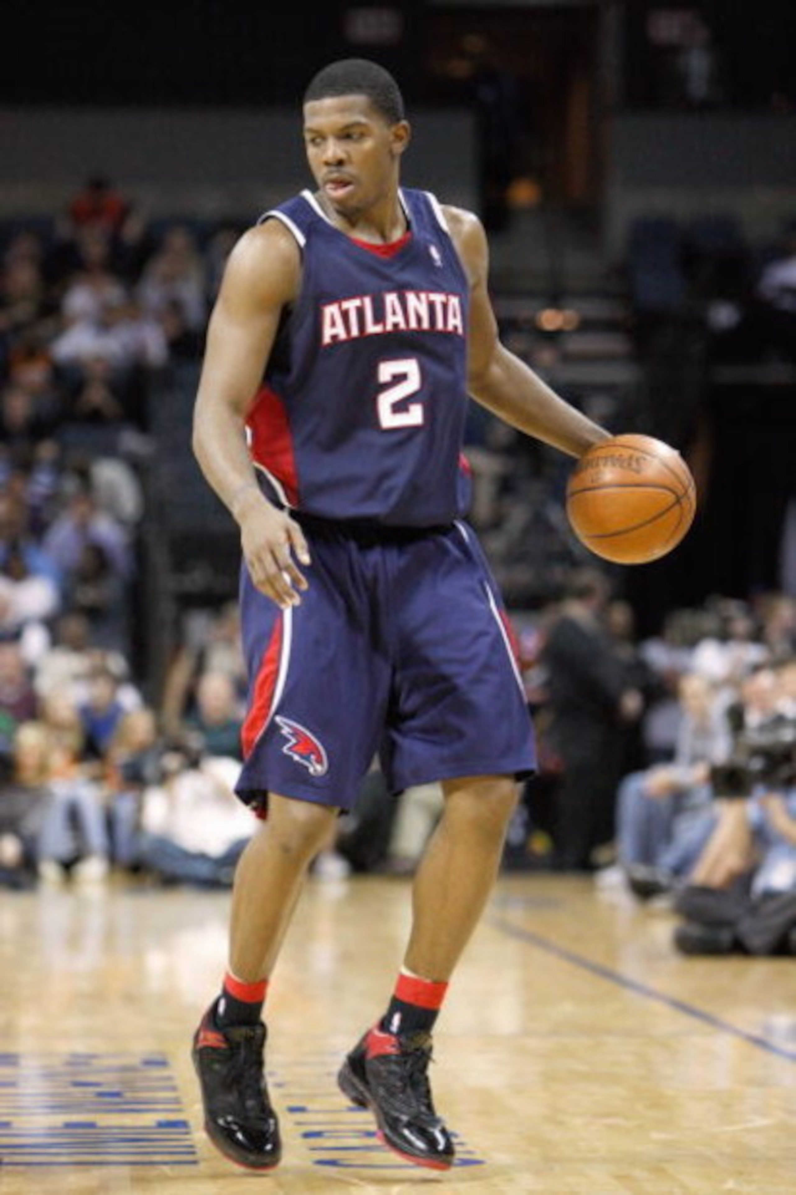 CHARLOTTE, NC - MARCH 6:  Joe Johnson #2 of the Atlanta Hawks dribbles the ball against the Charlotte Bobcats during their game at Time Warner Cable Arena on March 6, 2009 in Charlotte, North Carolina.  NOTE TO USER: User expressly acknowledges and agrees