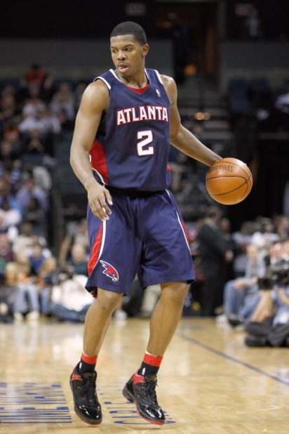 CHARLOTTE, NC - MARCH 6:  Joe Johnson #2 of the Atlanta Hawks dribbles the ball against the Charlotte Bobcats during their game at Time Warner Cable Arena on March 6, 2009 in Charlotte, North Carolina.  NOTE TO USER: User expressly acknowledges and agrees