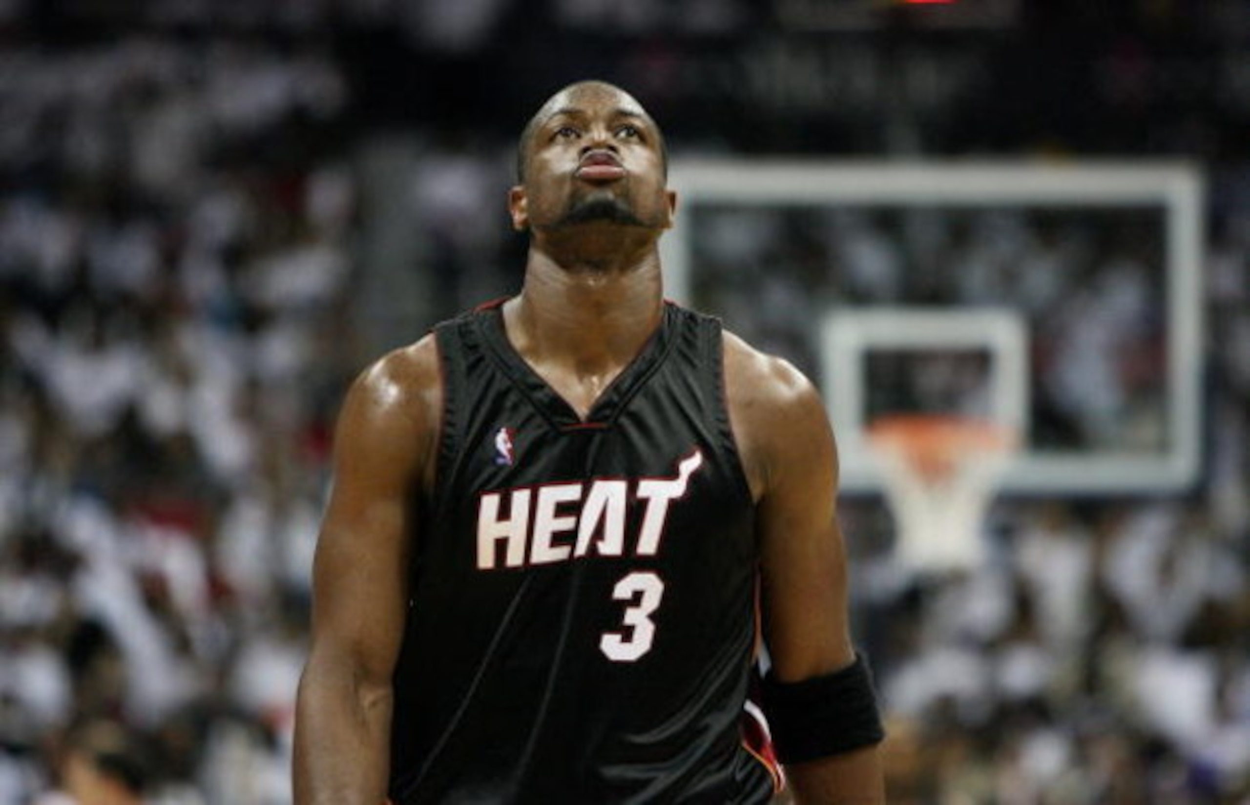 ATLANTA - APRIL 29:  Dwyane Wade #3 of the Miami Heat looks up as his team falls behind by 20 points in the fourth quarter against the Atlanta Hawks during Game Five of the Eastern Conference Quarterfinals at Philips Arena on April 29, 2009 in Atlanta, Ge