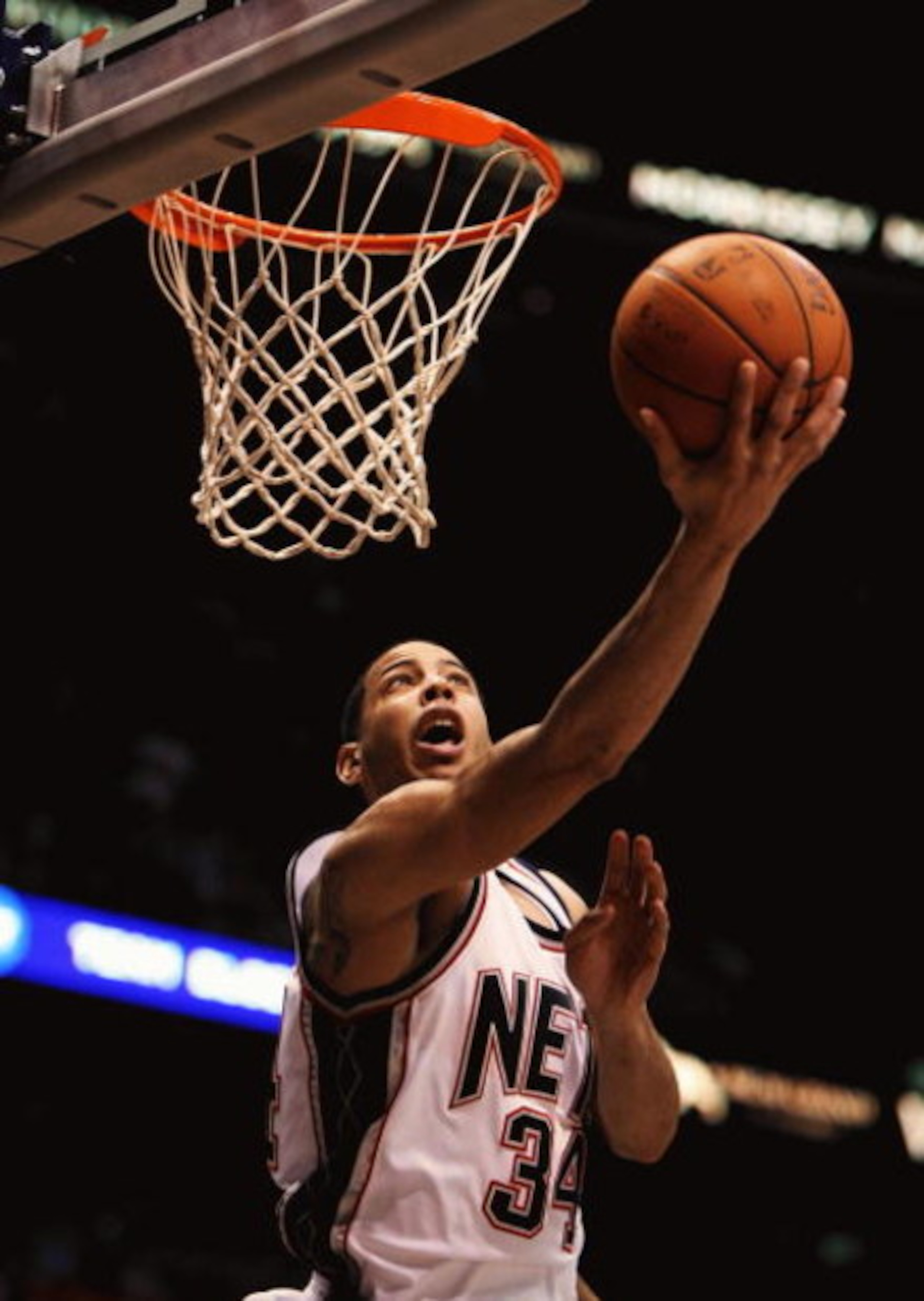 EAST RUTHERFORD, NJ - MARCH 04:  Devin Harris #34 of the New Jersey Nets shoots the ball against The Boston Celtics during their game on March 4th, 2009 at The Izod Center in East Rutherford, New Jersey.  NOTE TO USER: User expressly acknowledges and agre