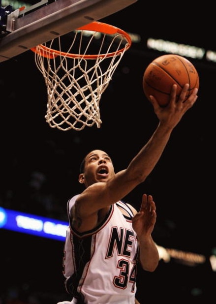 EAST RUTHERFORD, NJ - MARCH 04:  Devin Harris #34 of the New Jersey Nets shoots the ball against The Boston Celtics during their game on March 4th, 2009 at The Izod Center in East Rutherford, New Jersey.  NOTE TO USER: User expressly acknowledges and agre