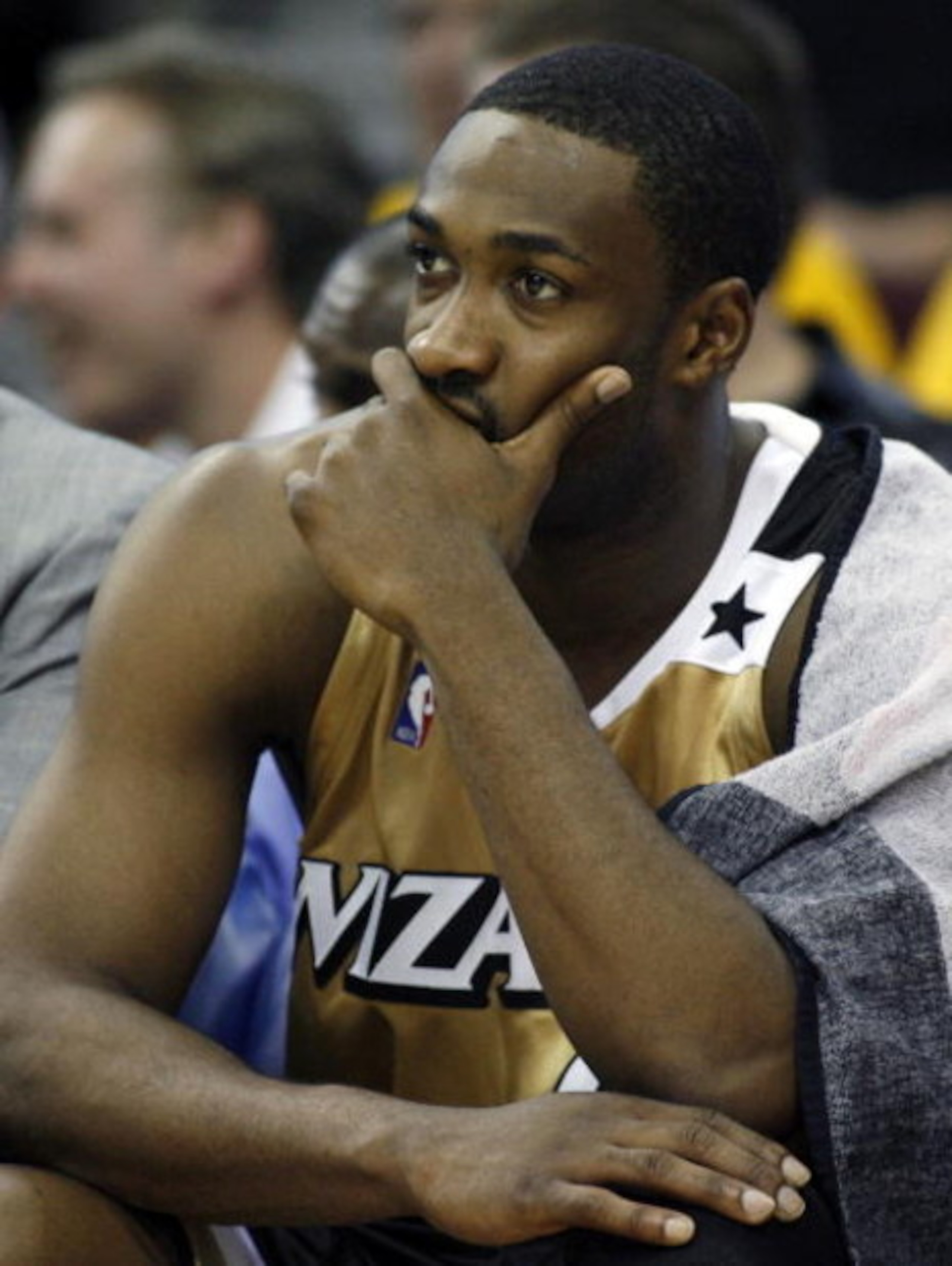 CLEVELAND - APRIL 21:  Gilbert Arenas #0 of the Washington Wizards looks on from the bench late in the game while playing the Cleveland Cavaliers in Game Two of the Eastern Conference Quarterfinals during the 2008 NBA Playoffs at Quicken Loans Arena April