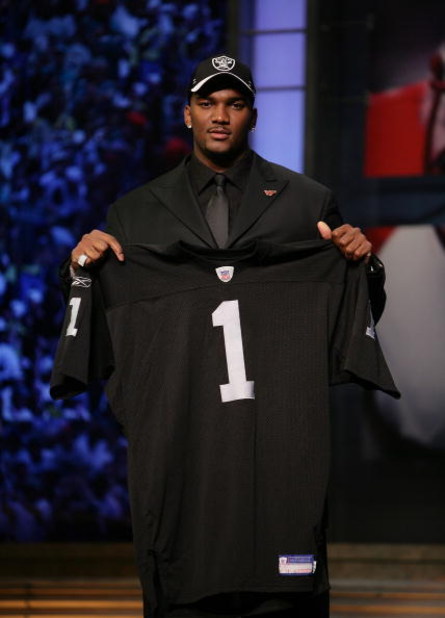 NEW YORK - APRIL 28:  JaMarcus Russell poses with his Oakland Raiders jersey after being chosen first overall by the Oakland Raiders at the 2007 NFL Draft at Radio City Music Hall April 28, 2007 in New York City.  (Photo by Nick Laham/Getty Images)