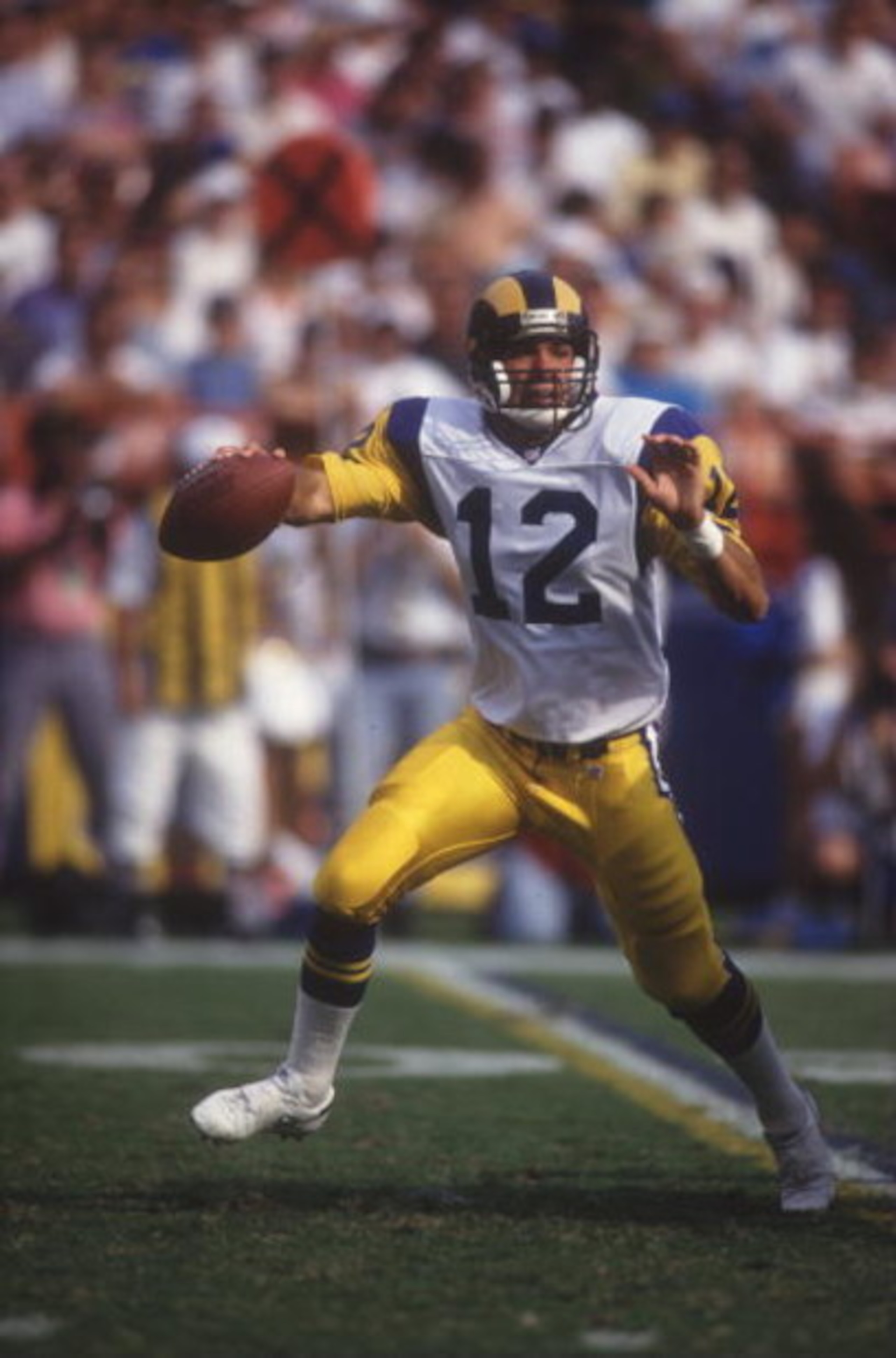 Los Angeles Rams quarterback T. J. Rubley scrambles during his team''s 16-13 loss to the Detroit Lions during week 8 of the NFL season. Rubley was a third quarter replacement for a struggling Jim Everett, and led the Rams to their two touchdowns. Mandator