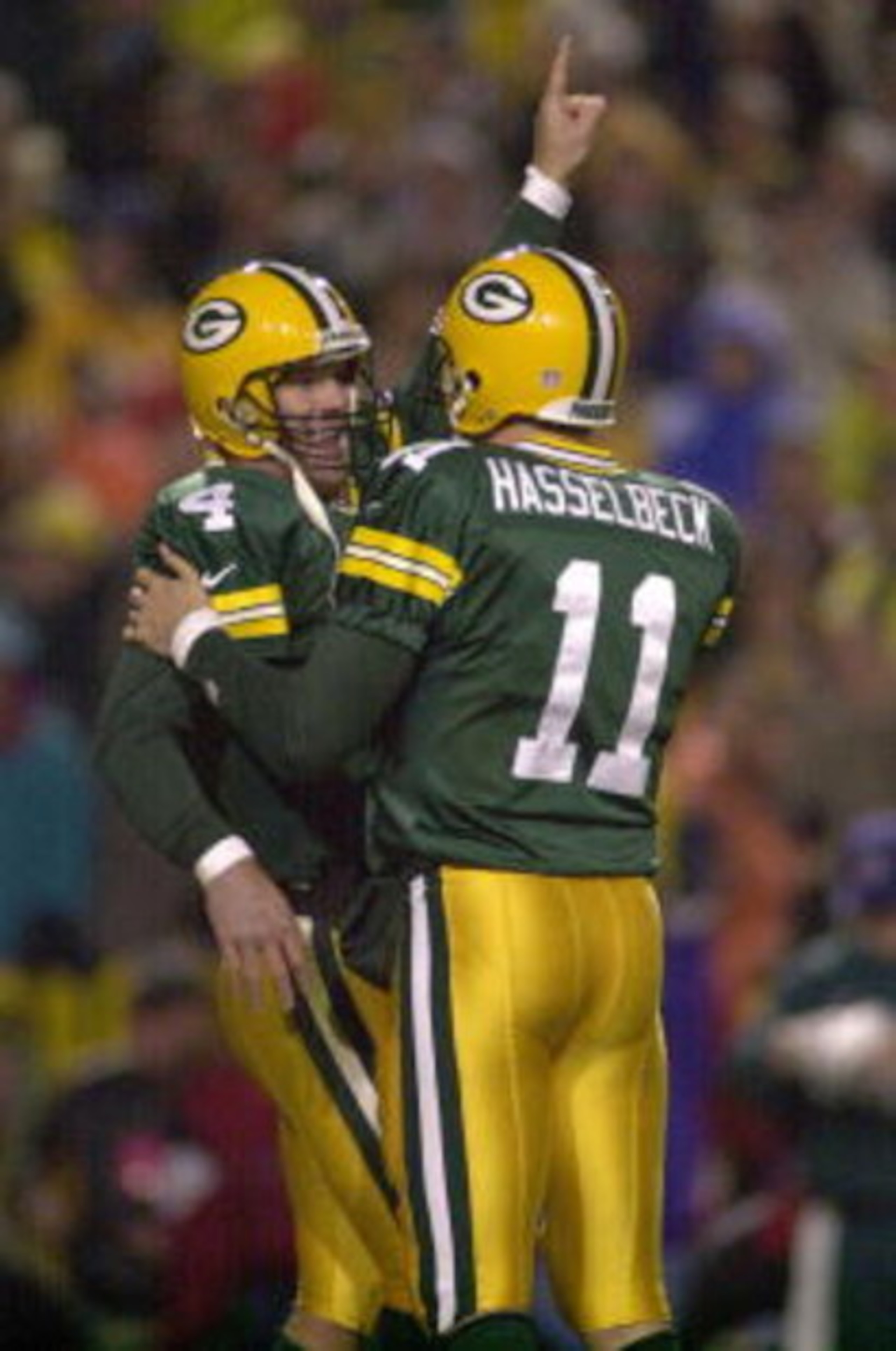 6 Nov 2000:  Quarterback Brett Favre of the Green Bay Packers celebrates with teammate Matt Hasselbeck a touchdown against the Minnesota Vikings in the second quarter at Lambeau Field in Green Bay, Wisconsin. <DIGITAL IMAGE> Mandatory Credit: Matthew Stoc