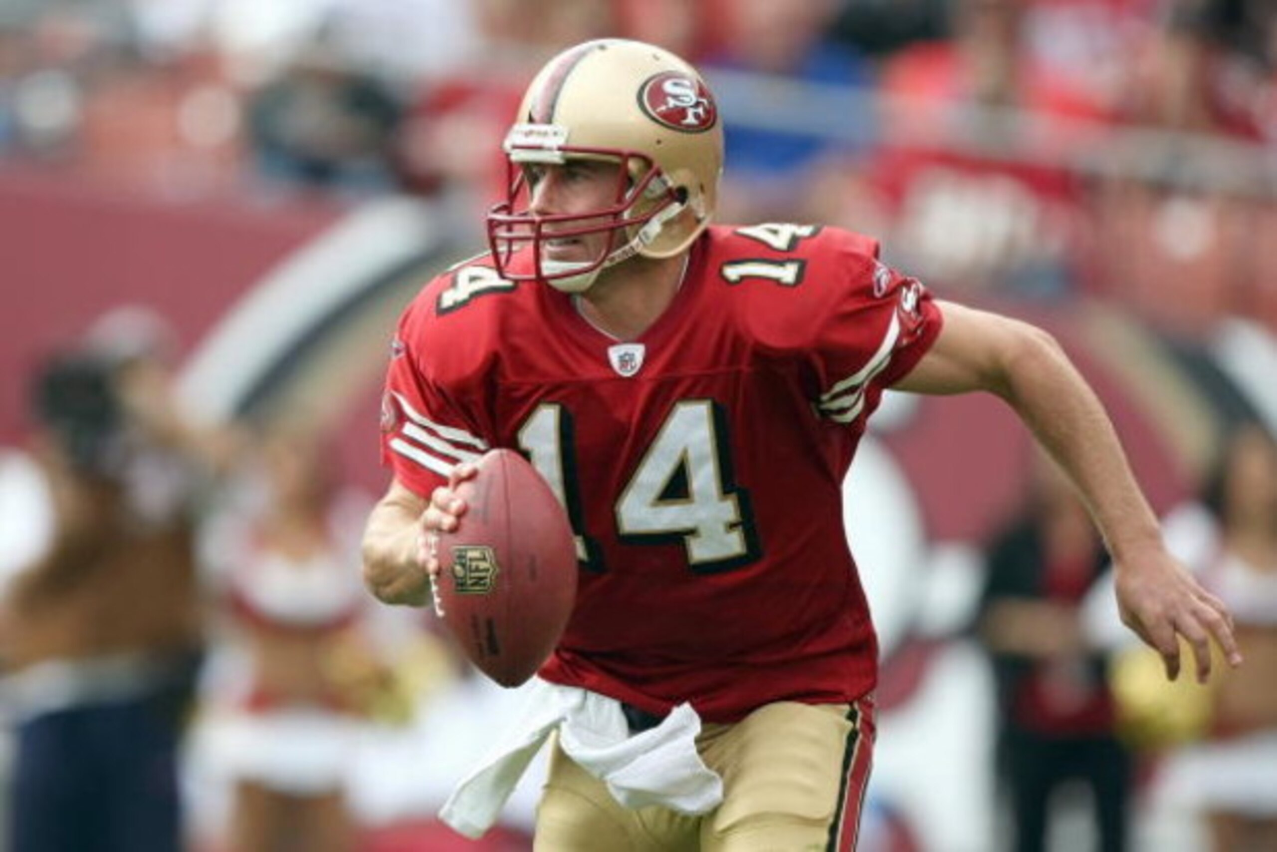 SAN FRANCISCO - OCTOBER 5: Quarterback  J.T. O'Sullivan #14 of the San Francisco 49ers runs with the ball during the game against the New England Patriots on October 5, 2008 at Candlestick Park in San Francisco, California. (Photo by Jed Jacobsohn/Getty I