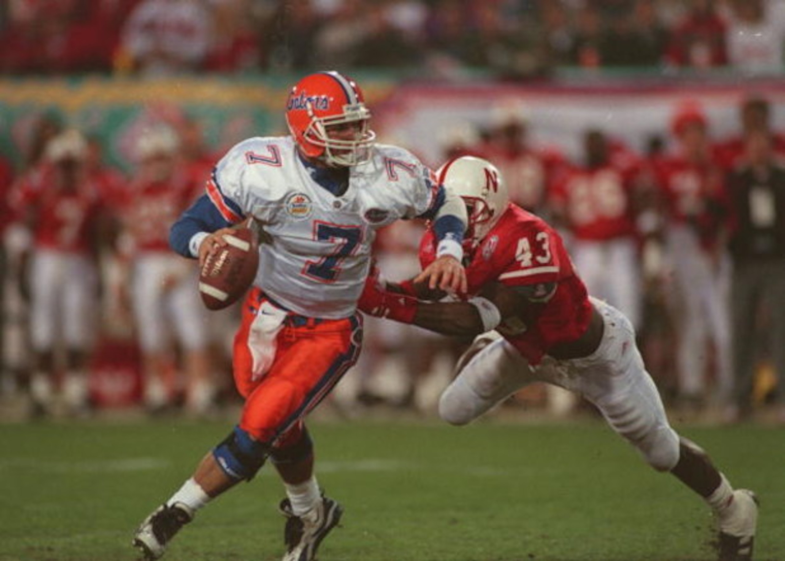 2 Jan 1996:  Quarterback Danny Wuerffel #7 of the University of Florida attempts to avoid the tackle by linebacker Terrell Farley of the University of Nebraska during the Fiesta Bowl at Sun Devil Stadium in Tempe, Arizona. Mandatory Credit: Stephen Dunn/A