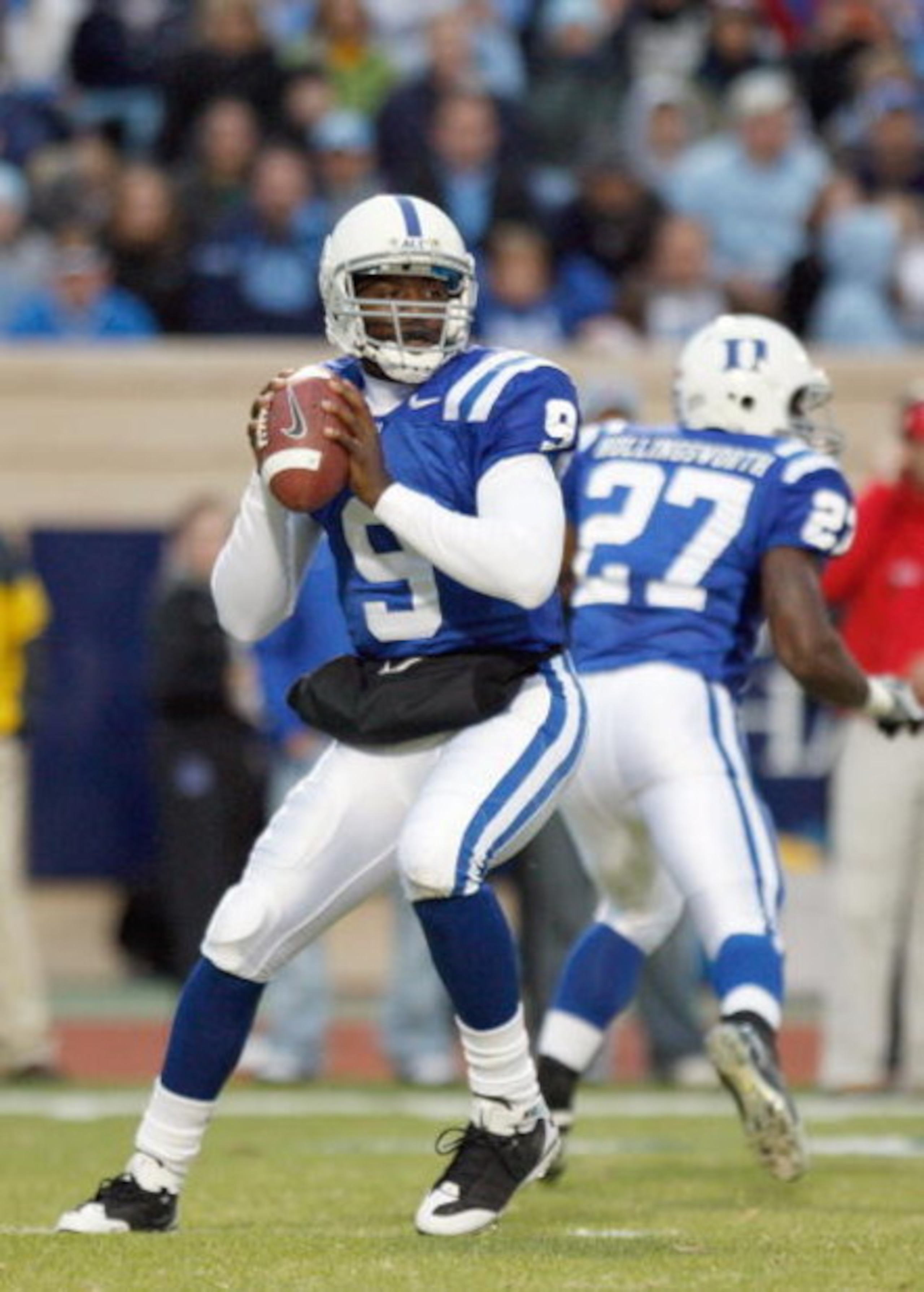 DURHAM, NC - NOVEMBER 29:  Quarterback Thaddeus Lewis #9 of the Duke Blue Devils drops back to pass the ball during the game against the North Carolina Tar Heels at Wallace Wade Stadium on November 29, 2008 in Durham, North Carolina. (Photo by Kevin C. Co