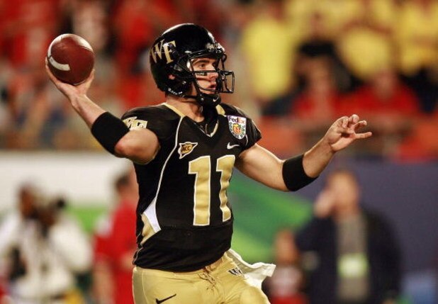MIAMI GARDENS, FL - JANUARY 02:  Riley Skinner #11 of the Wake Forest Demon Deacons looks to pass against the Louisville Cardinals during the 2007 FedEx Orange Bowl at Dolphin Stadium on January 2, 2007 in Miami Gardens, Florida.  (Photo by Doug Benc/Gett