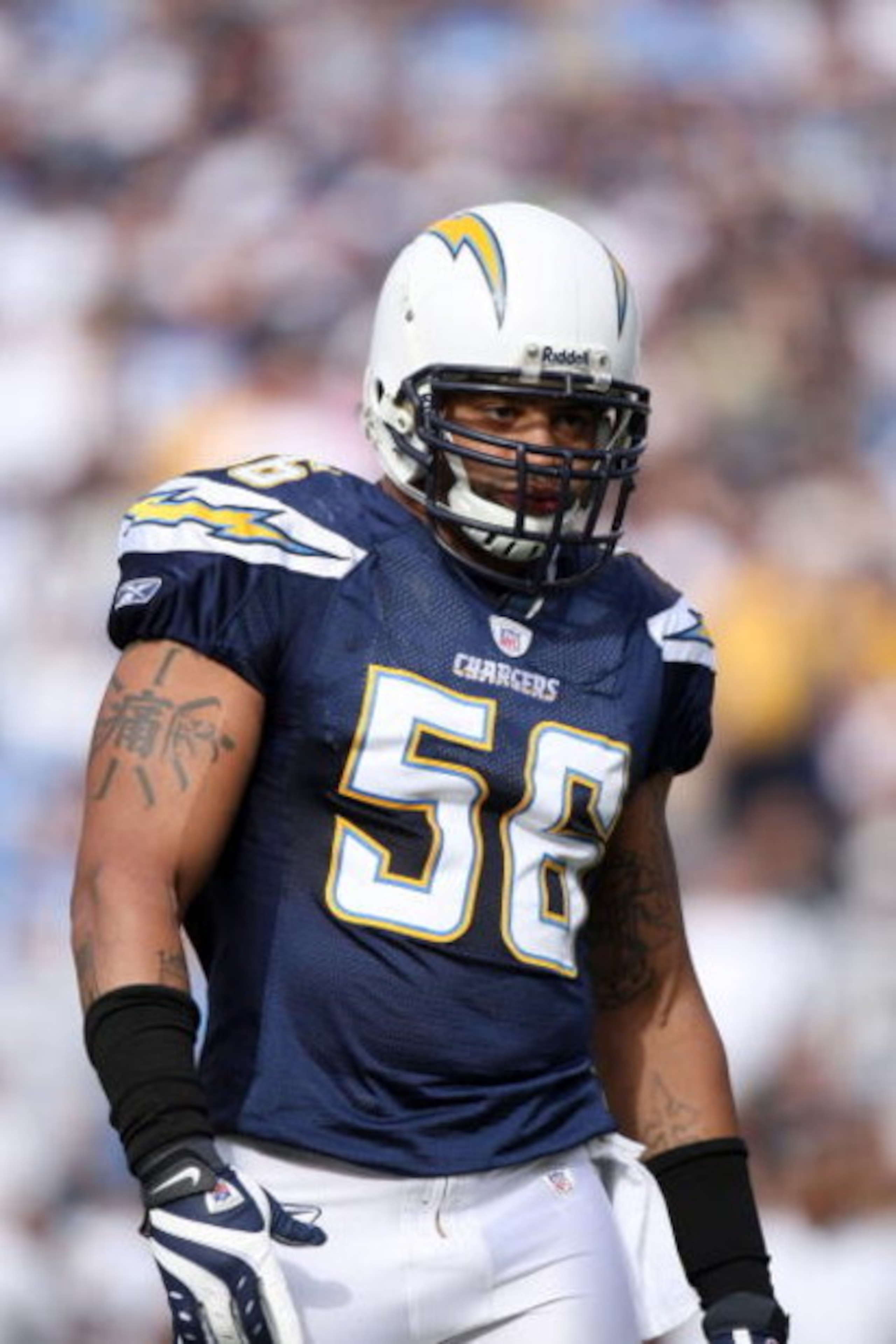 SAN DIEGO - NOVEMBER 25:  Shawne Merriman #56 of the San Diego Chargers defends against the Baltimore Ravens during their NFL Game at Qualcomm Stadium November 25, 2007 in San Diego, California.  (Photo by Donald Miralle/Getty Images)