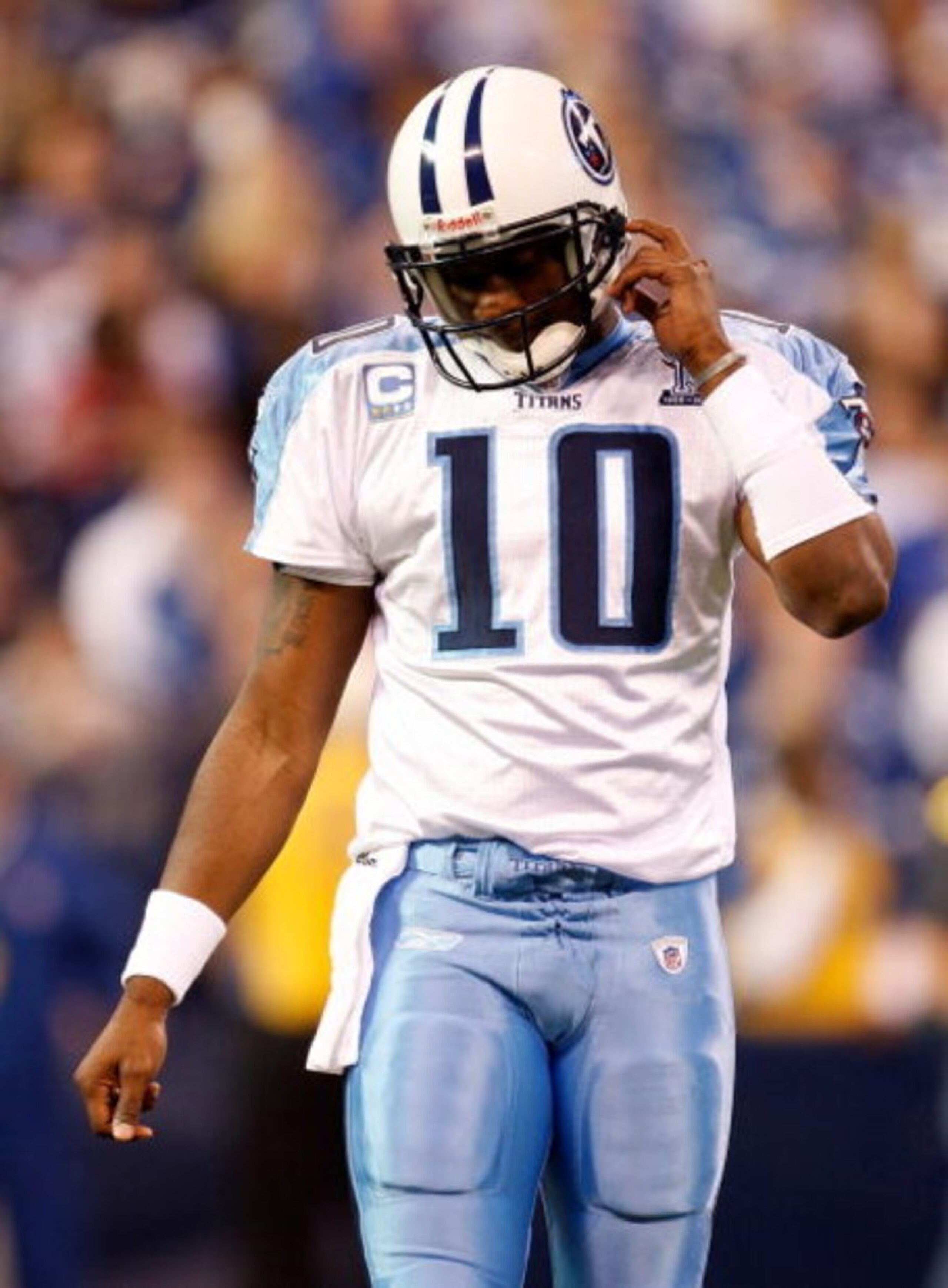 INDIANAPOLIS - DECEMBER 28:  Quarterback Vince Young #10 of the Tennessee Titans walks off the field during the game against the Indianapolis Colts at Lucas Oil Stadium December 28, 2008 in Indianapolis, Indiana.  (Photo by Jamie Squire/Getty Images)