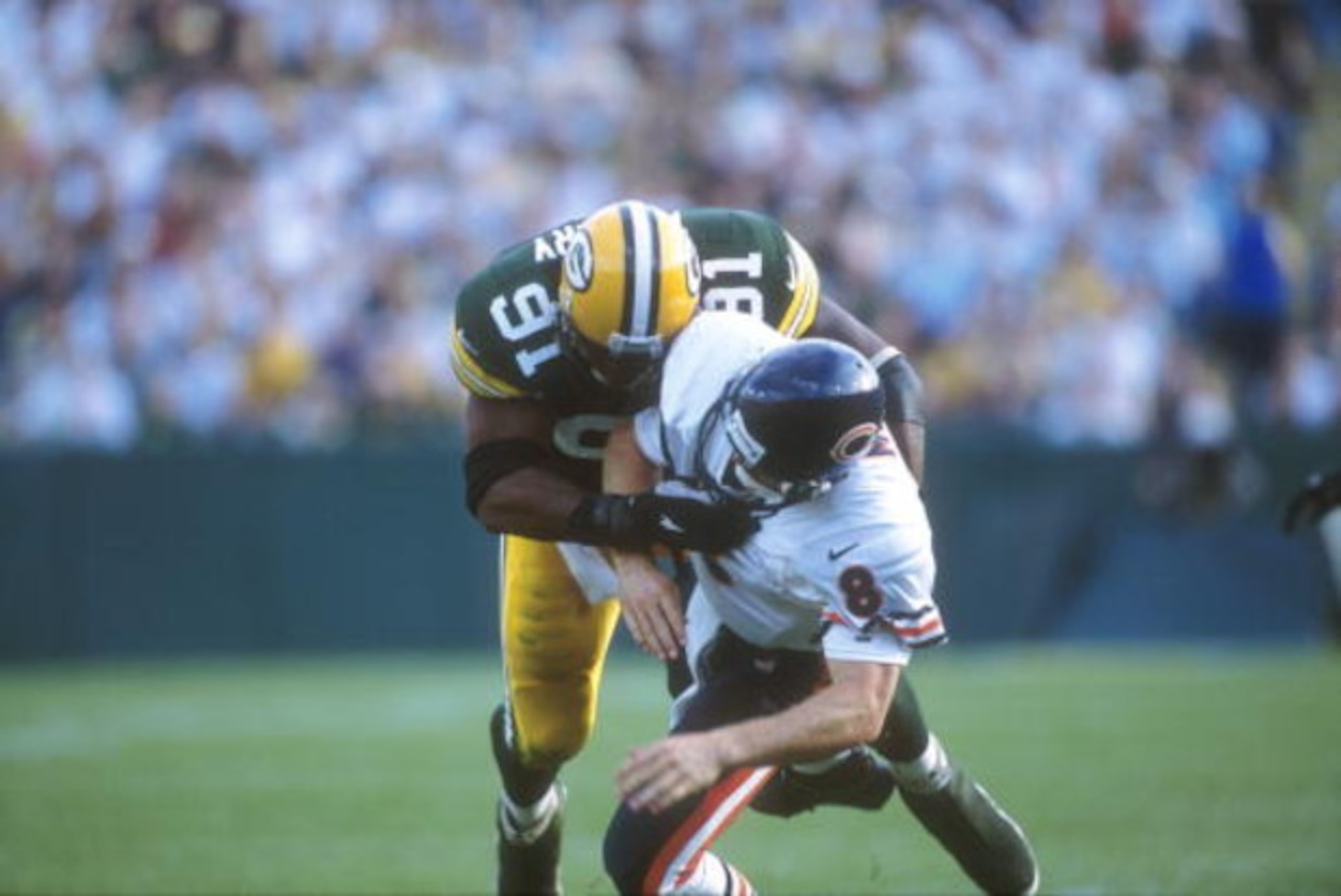 10 Oct 2000: #91 John Thierry of the Green Bay Packers tackles #8 Cade McNown of the Chicago Bears during the Bears v Packers game in which the Bears defeated the Packers 27-24 at Lambeau Field in Green Bay, Wisconsin. Mandatory Credit: Jonathan Daniel/ 10 Oct 2000: #91 John Thierry of the Green Bay Packers tackles #8 Cade McNown of the Chicago Bears during the Bears v Packers game in which the Bears defeated the Packers 27-24 at Lambeau Field in Green Bay, Wisconsin. Mandatory Credit: Jonathan Daniel/