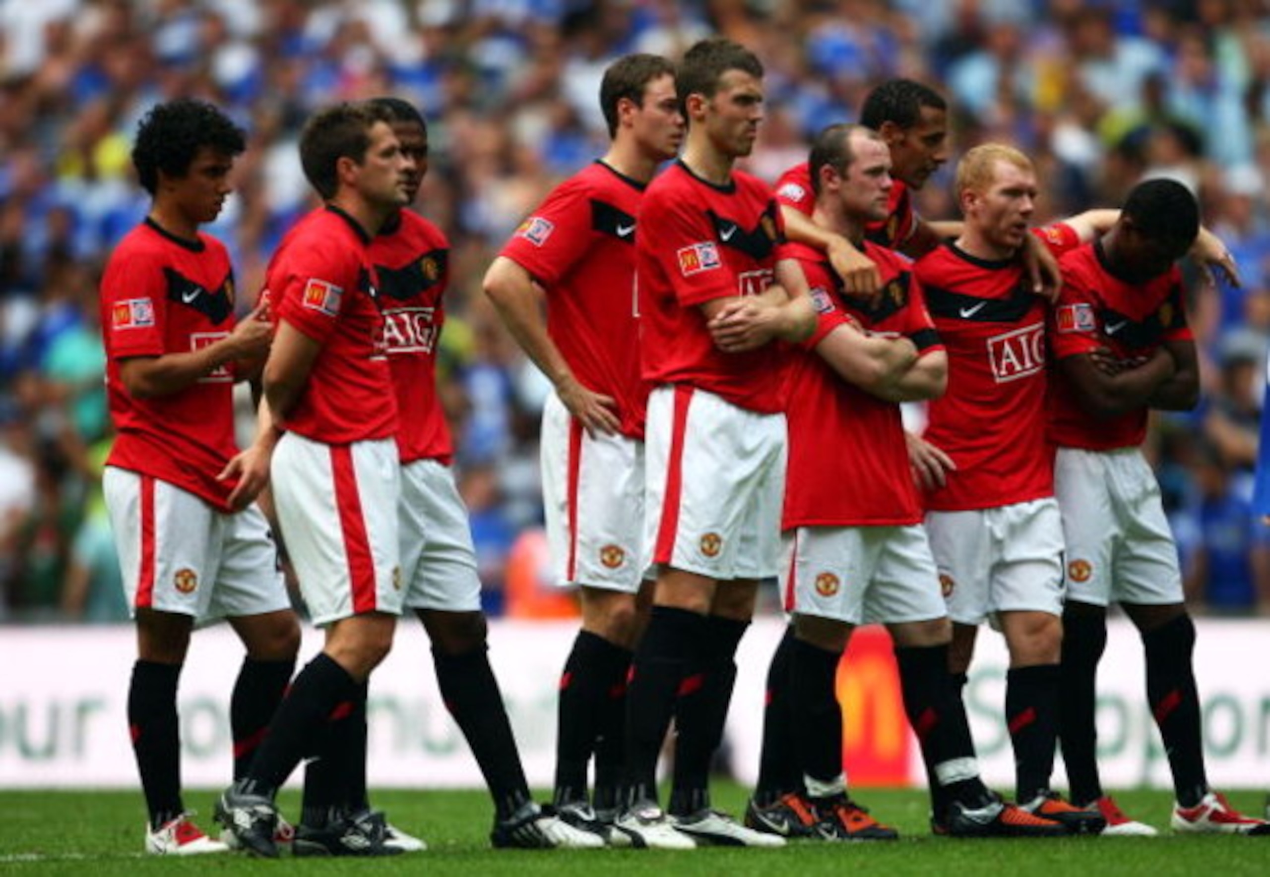 LONDON, ENGLAND - AUGUST 09:  Manchester United players look despondent in the penalty shoot out during the FA Community Shield match between Manchester United and Chelsea at Wembley Stadium on August 9, 2009 in London, England.  (Photo by Jamie McDonald/
