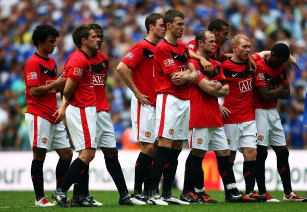 LONDON, ENGLAND - AUGUST 09:  Manchester United players look despondent in the penalty shoot out during the FA Community Shield match between Manchester United and Chelsea at Wembley Stadium on August 9, 2009 in London, England.  (Photo by Jamie McDonald/