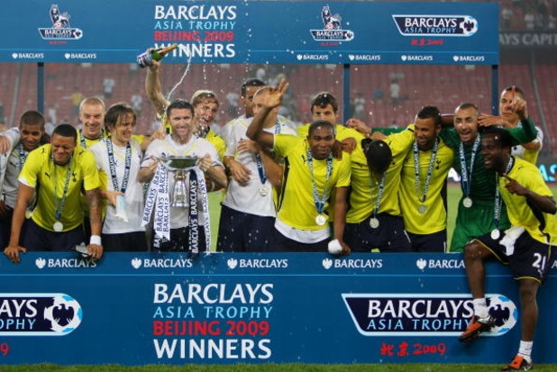 BEIJING - JULY 31:  Players of Tottenham Hotspur celebrate their winning after the Barclays Asia Trophy pre-season friendly match between Tottenham Hotspur and Hull City at Workers Stadium on July 31, 2009 in Beijing, China.  (Photo by Feng Li/Getty Image
