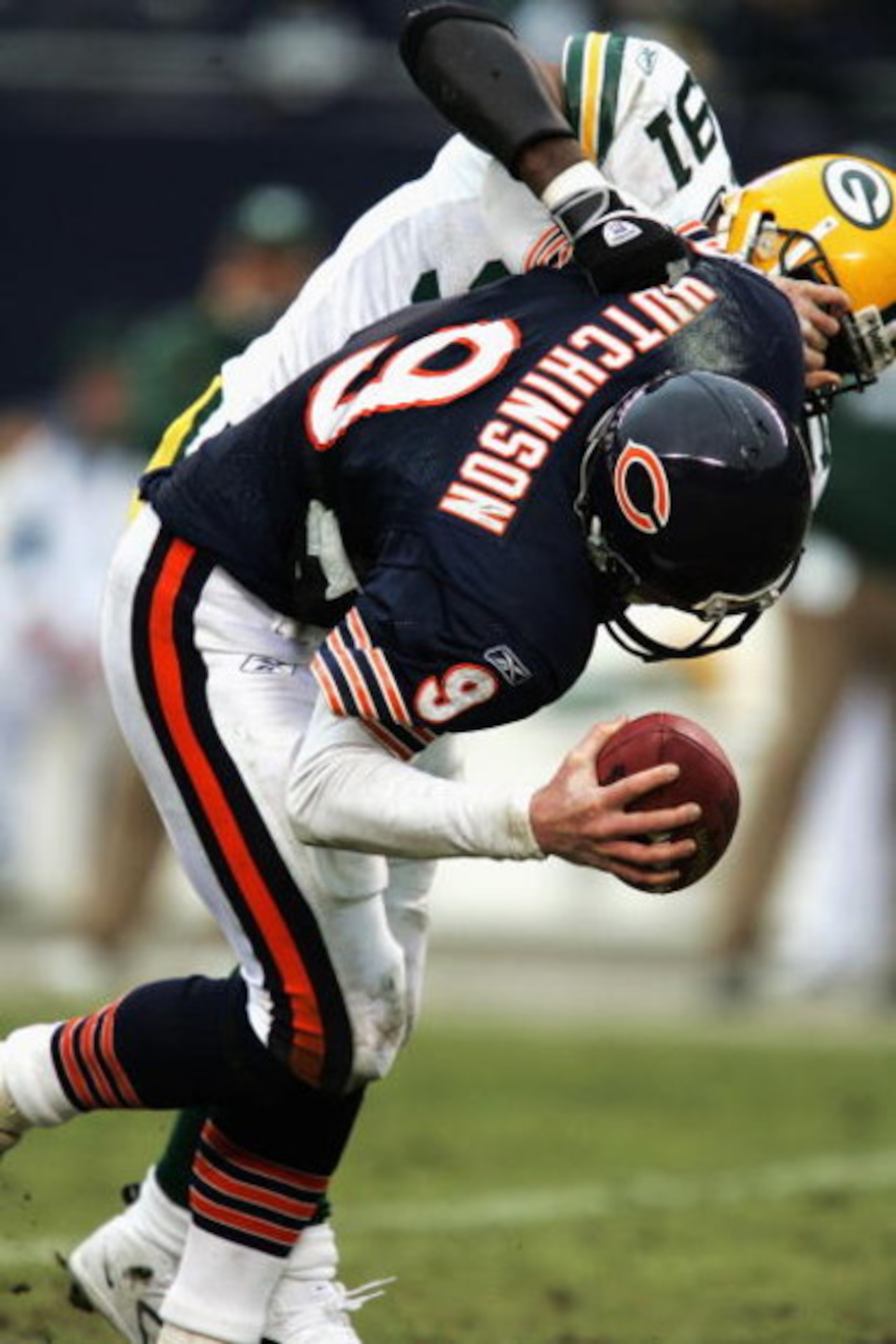 CHICAGO - JANUARY 2: Quarterback Chad Hutchinson #9 of the Chicago Bears is sacked by defensive end R-Kal Truluck #91 of the Green Bay Packers on January 2, 2005 at Soldier Field in Chicago, Illinois. The Packers defeated the Bears 31-14. (Photo by Jonath CHICAGO - JANUARY 2: Quarterback Chad Hutchinson #9 of the Chicago Bears is sacked by defensive end R-Kal Truluck #91 of the Green Bay Packers on January 2, 2005 at Soldier Field in Chicago, Illinois. The Packers defeated the Bears 31-14. (Photo by Jonath